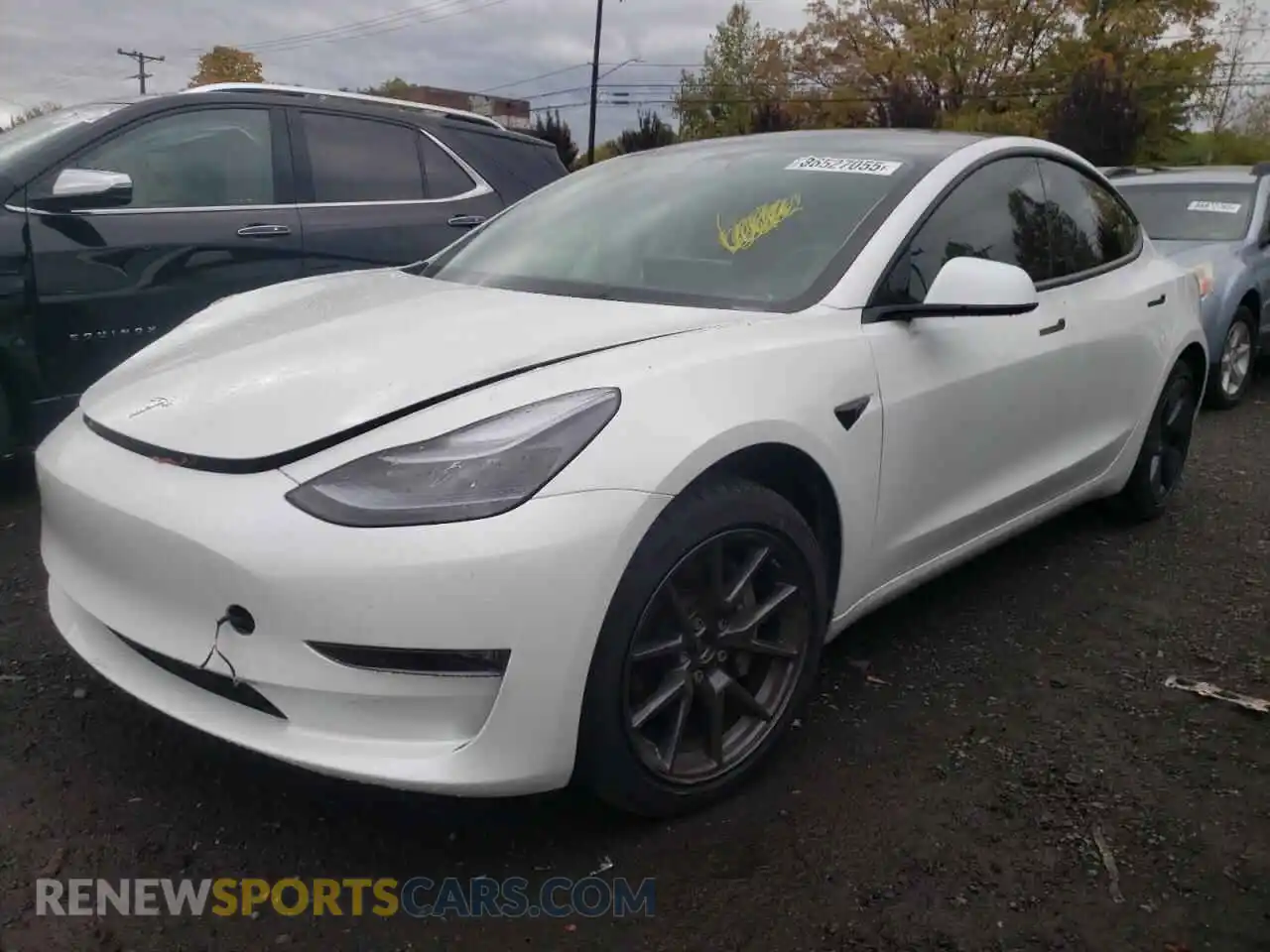 1 Photograph of a damaged car 5YJ3E1EB6PF596645 TESLA MODEL 3 2023