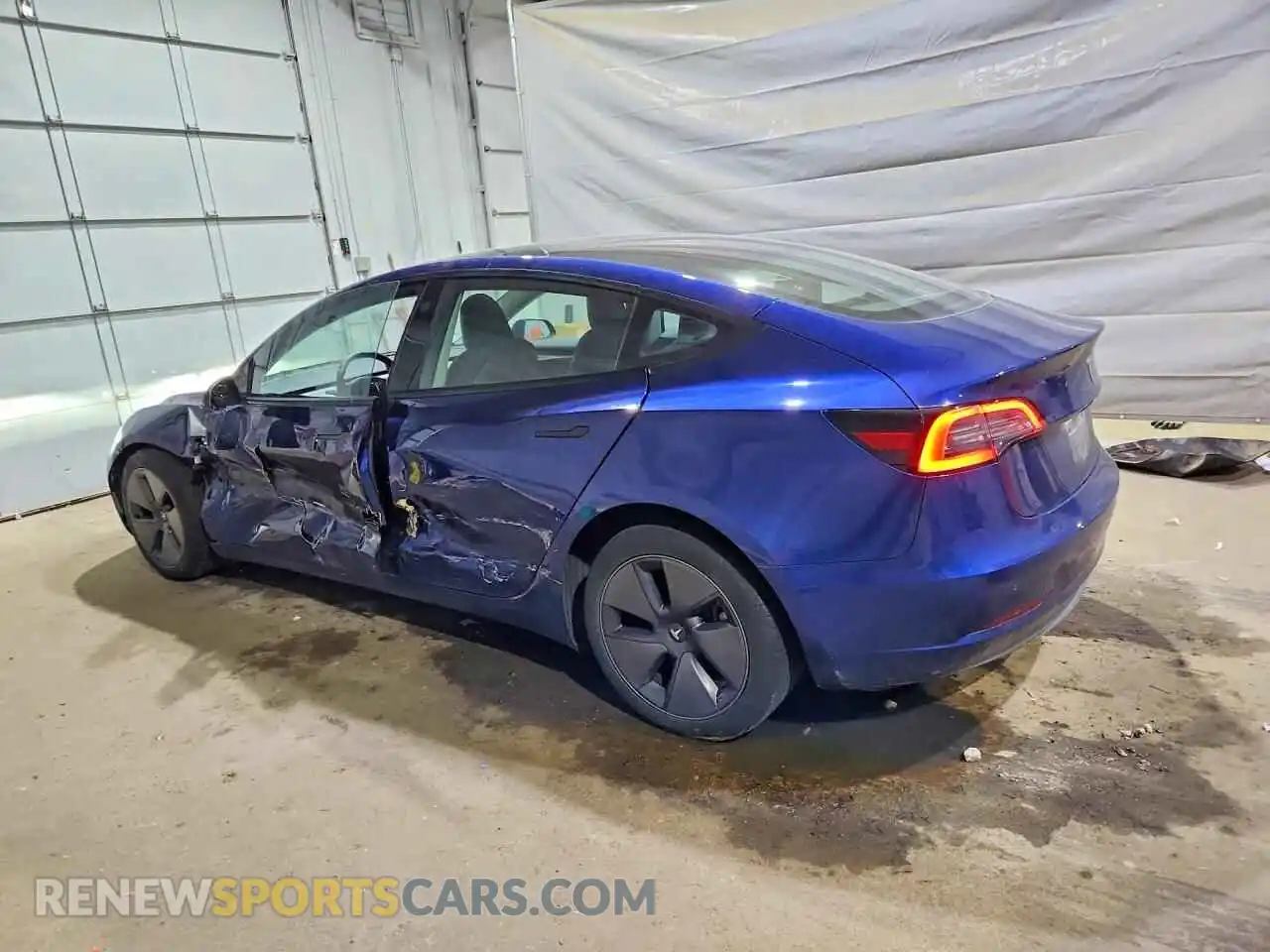 2 Photograph of a damaged car 5YJ3E1EB7PF694289 TESLA MODEL 3 2023