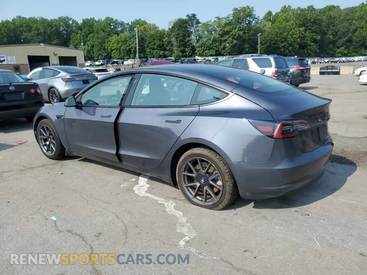 2 Photograph of a damaged car 5YJ3E1EB8PF602767 TESLA MODEL 3 2023