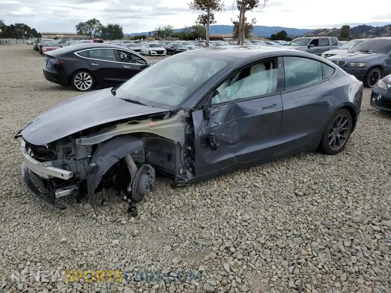 1 Photograph of a damaged car 5YJ3E1EB8PF661236 TESLA MODEL 3 2023