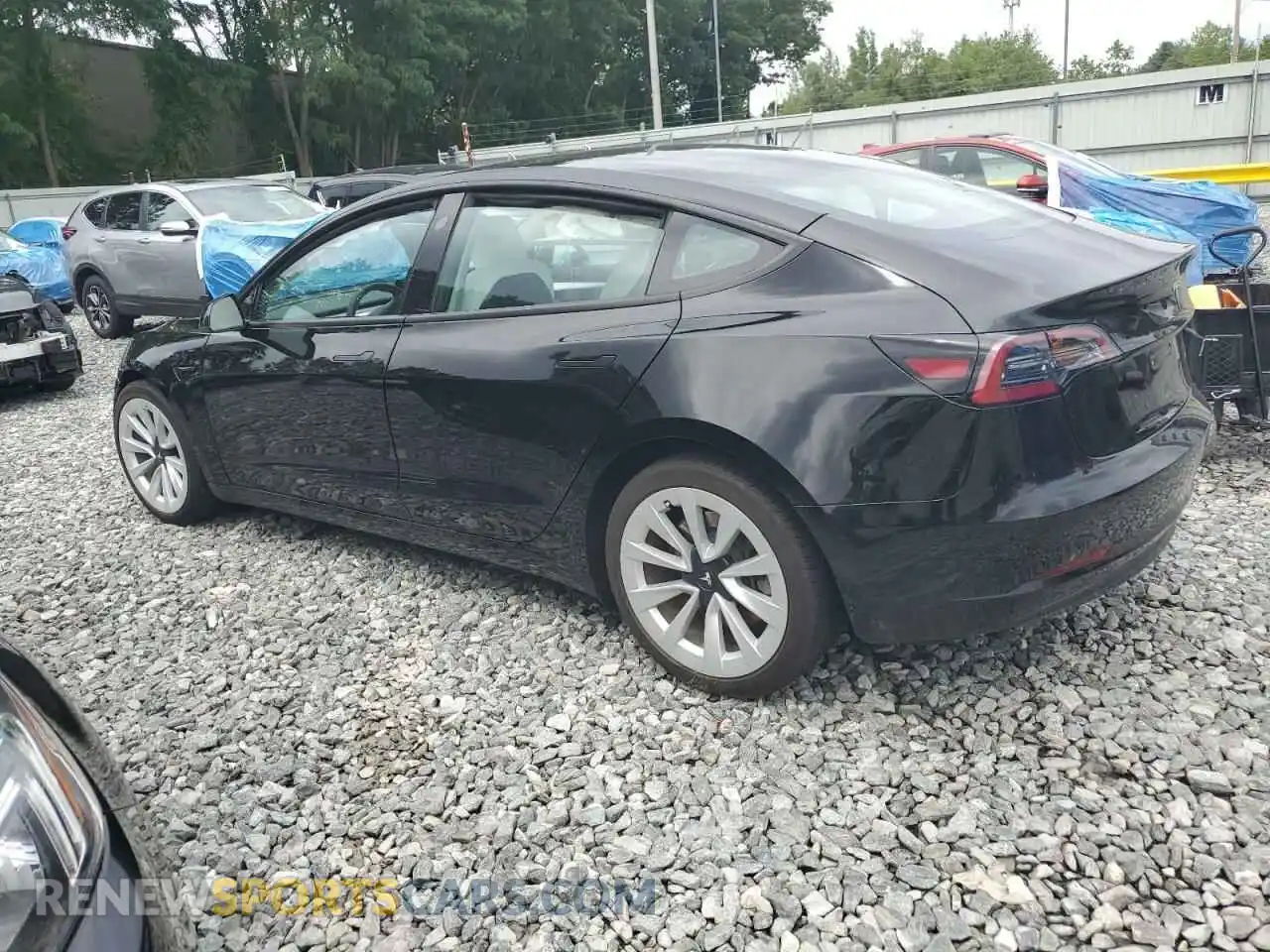 2 Photograph of a damaged car 5YJ3E1EB8PF662158 TESLA MODEL 3 2023