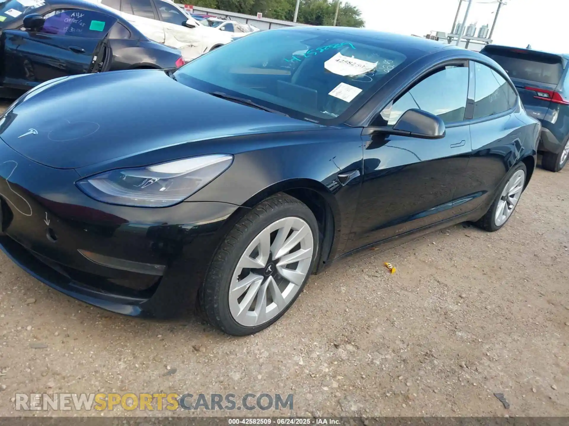 2 Photograph of a damaged car 5YJ3E1EB9PF415232 TESLA MODEL 3 2023