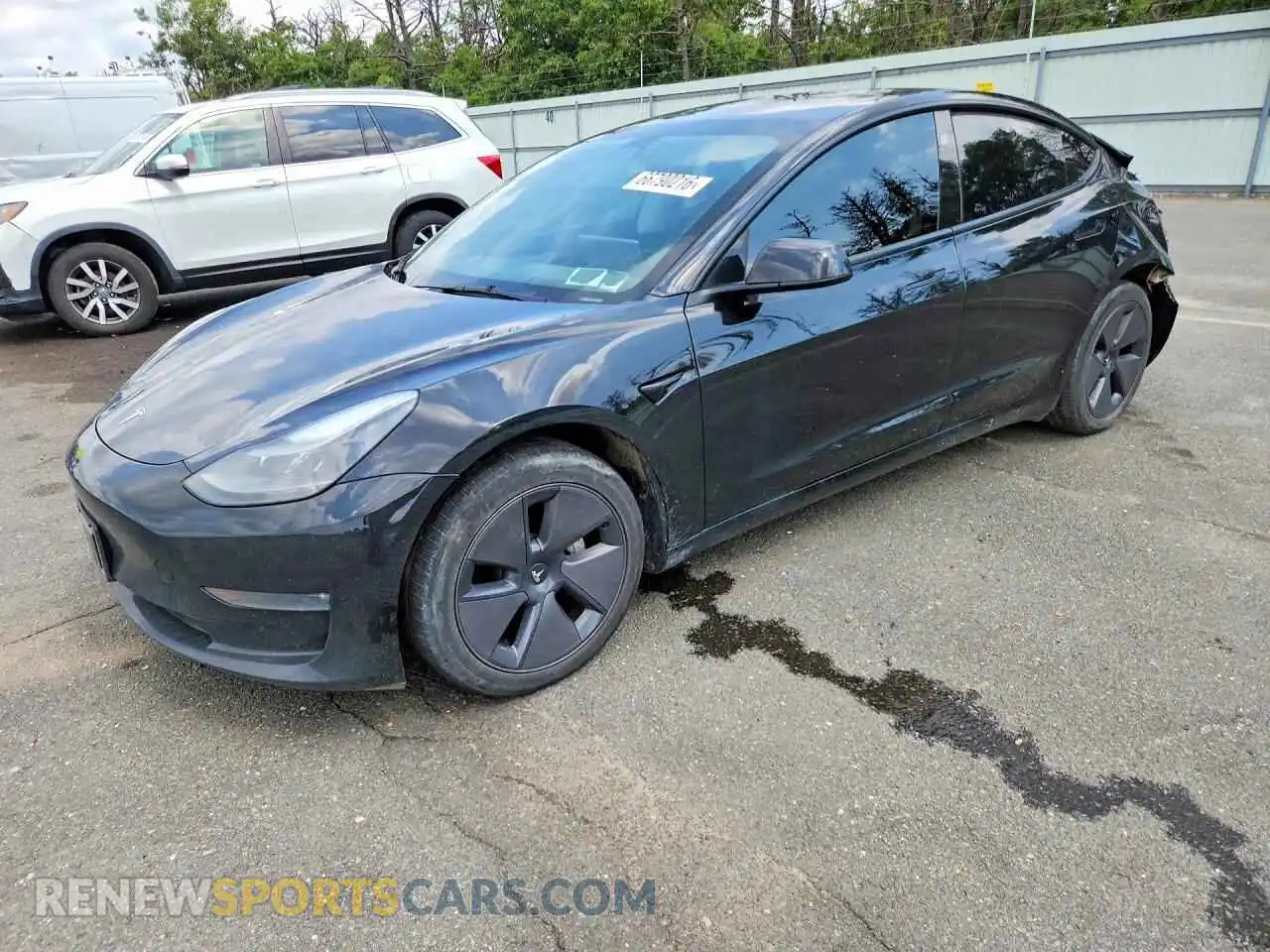 1 Photograph of a damaged car 5YJ3E1EB9PF710413 TESLA MODEL 3 2023