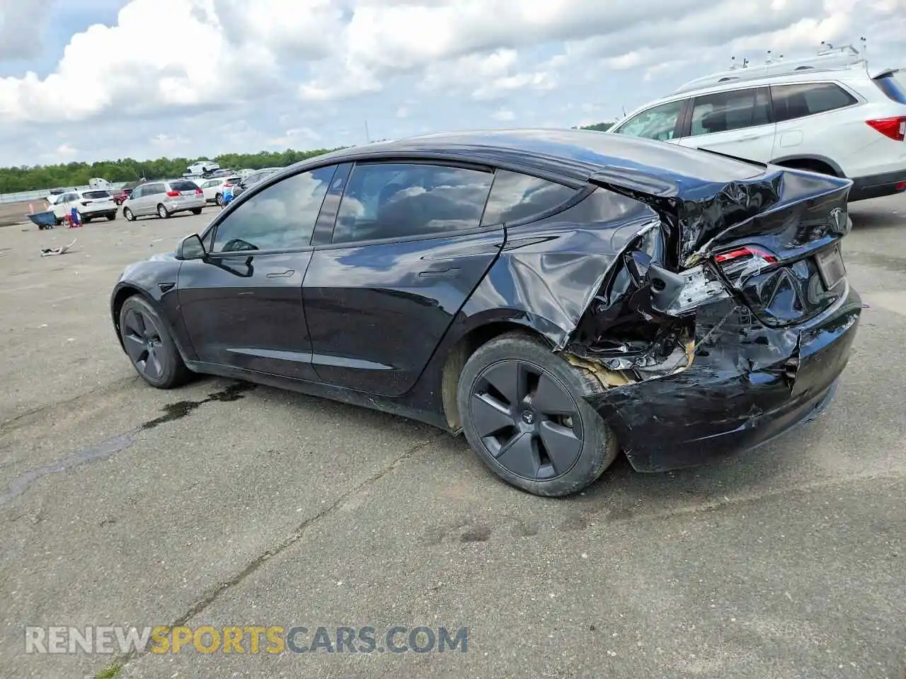 2 Photograph of a damaged car 5YJ3E1EB9PF710413 TESLA MODEL 3 2023