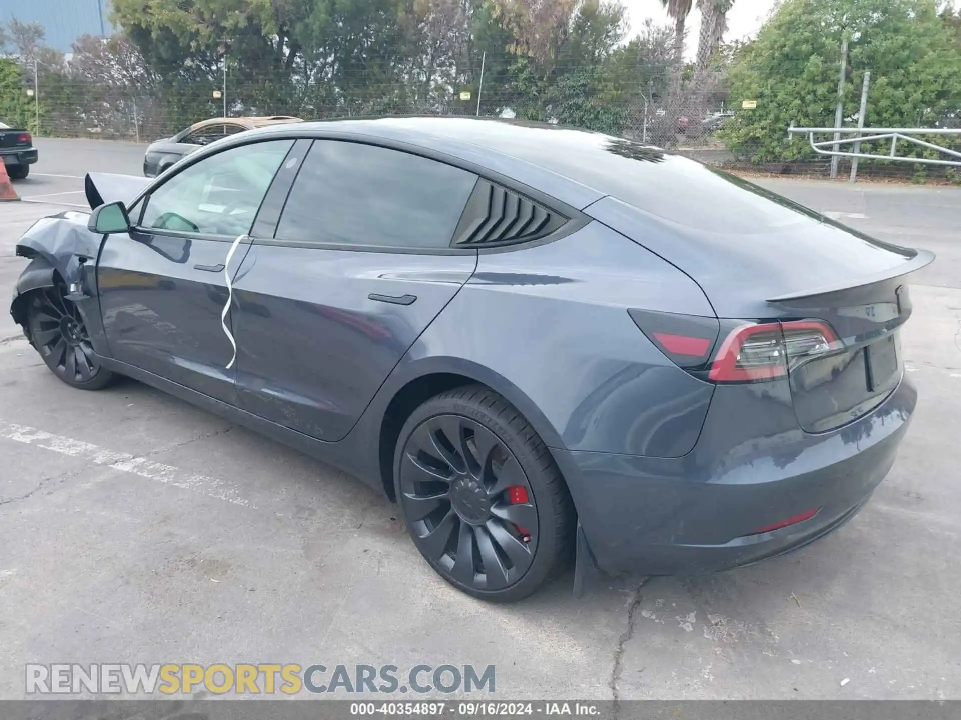 3 Photograph of a damaged car 5YJ3E1EC0PF498784 TESLA MODEL 3 2023