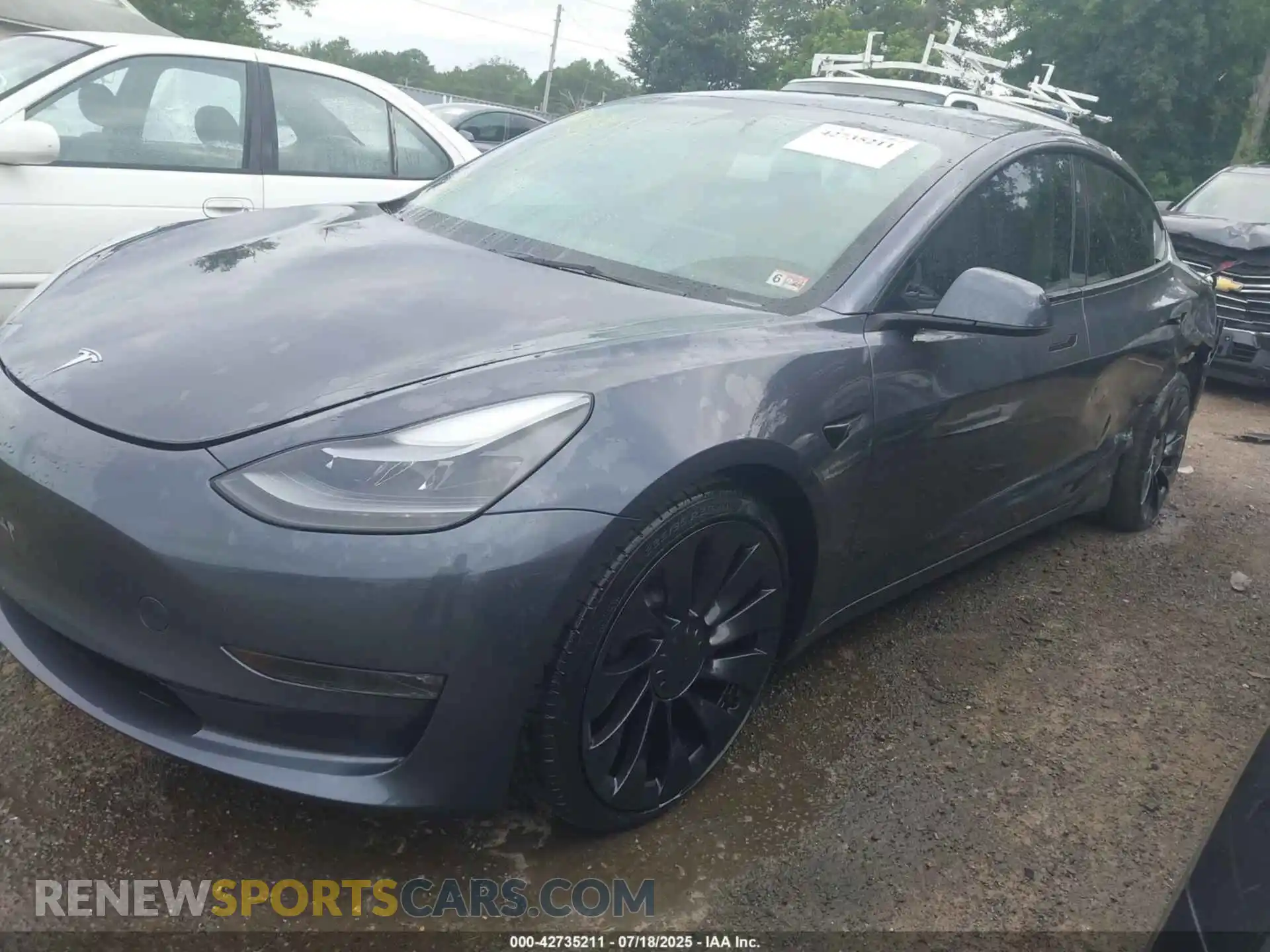 2 Photograph of a damaged car 5YJ3E1EC0PF590736 TESLA MODEL 3 2023