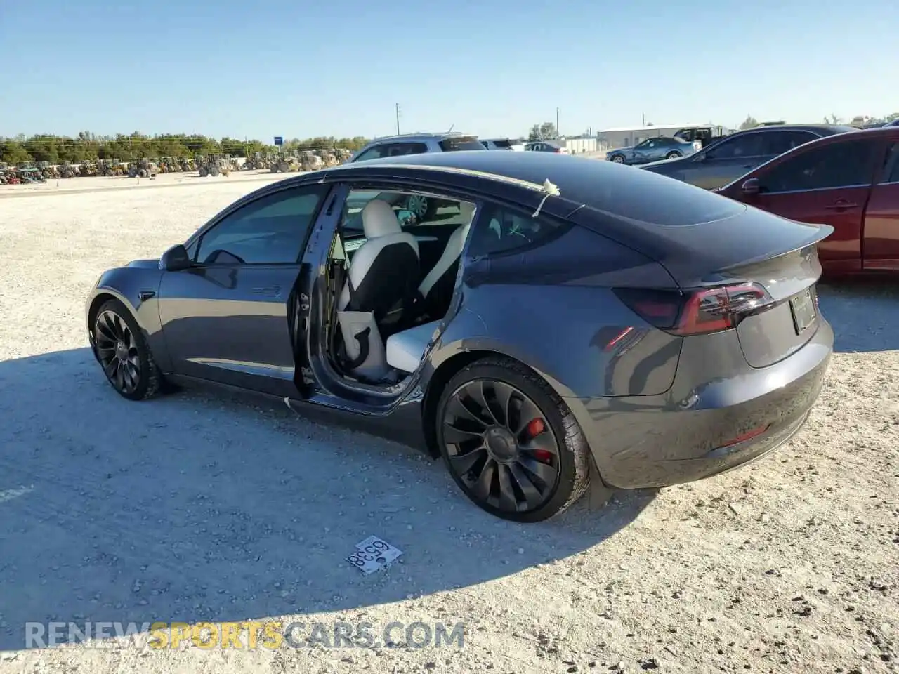 2 Photograph of a damaged car 5YJ3E1EC0PF631513 TESLA MODEL 3 2023