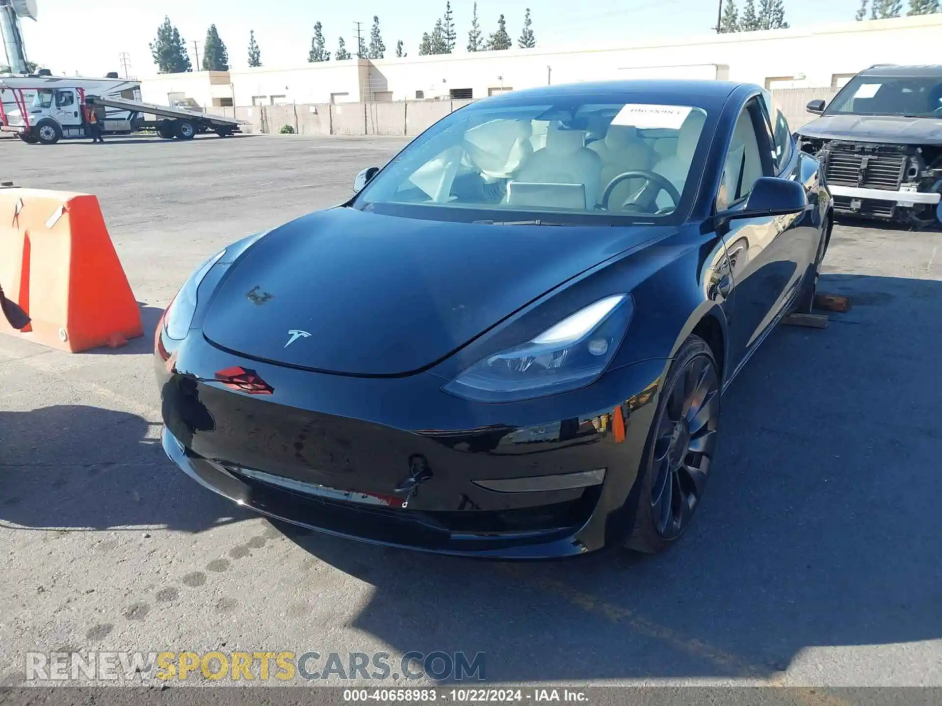 2 Photograph of a damaged car 5YJ3E1EC0PF712222 TESLA MODEL 3 2023
