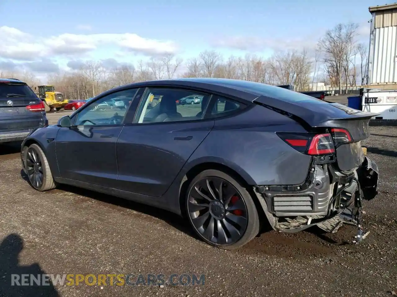 2 fotografías del automóvil dañado 5YJ3E1EC1PF710382 TESLA MODEL 3 2023