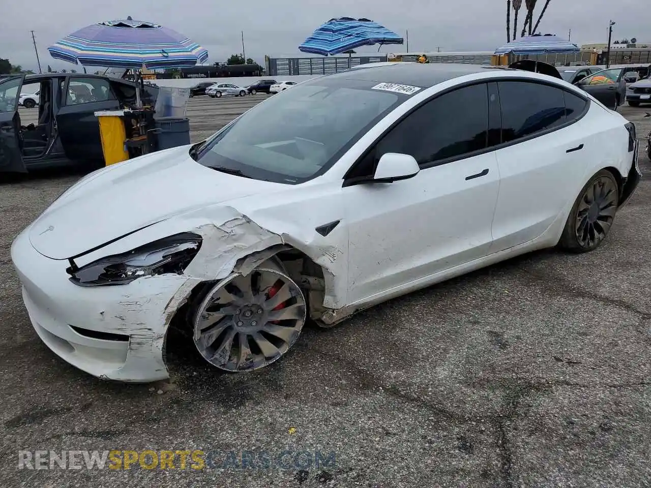 2 Photograph of a damaged car 5YJ3E1EC2PF552134 TESLA MODEL 3 2023