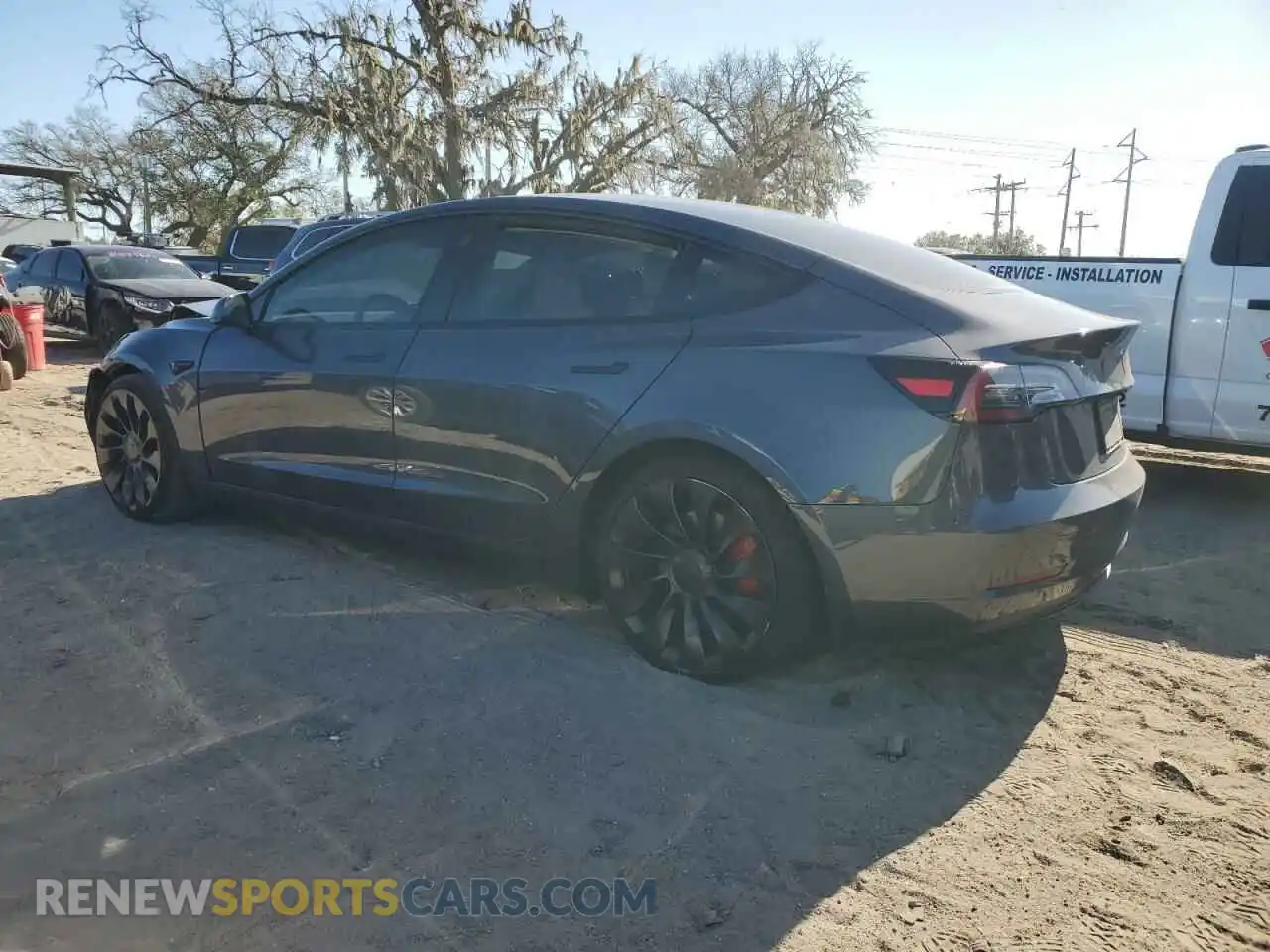 2 Photograph of a damaged car 5YJ3E1EC2PF557284 TESLA MODEL 3 2023