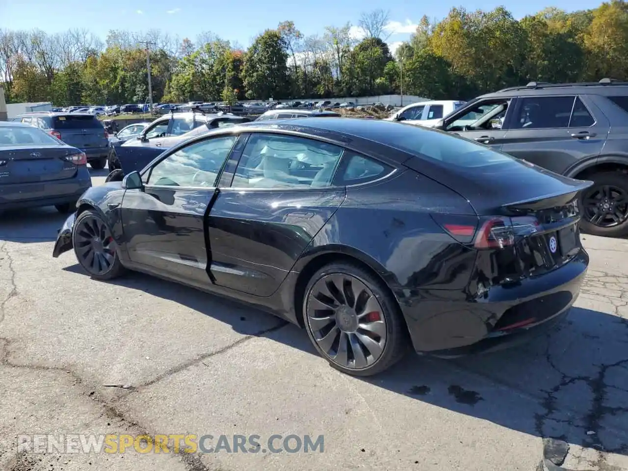 2 fotografías del automóvil dañado 5YJ3E1EC2PF562968 TESLA MODEL 3 2023