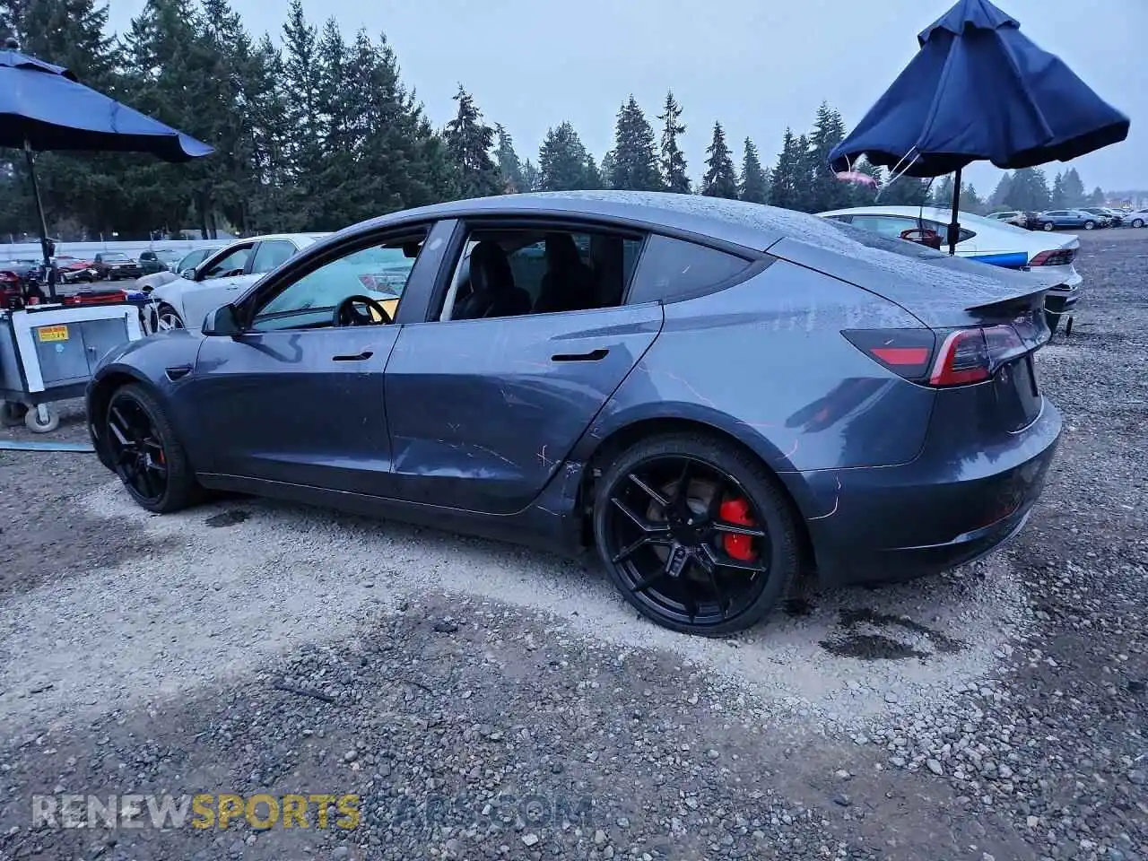 2 Photograph of a damaged car 5YJ3E1EC2PF670491 TESLA MODEL 3 2023