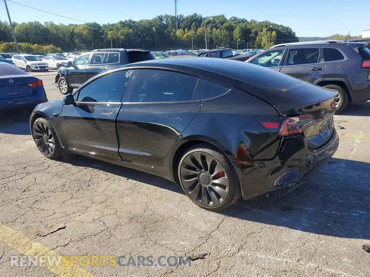 2 Photograph of a damaged car 5YJ3E1EC2PF671981 TESLA MODEL 3 2023