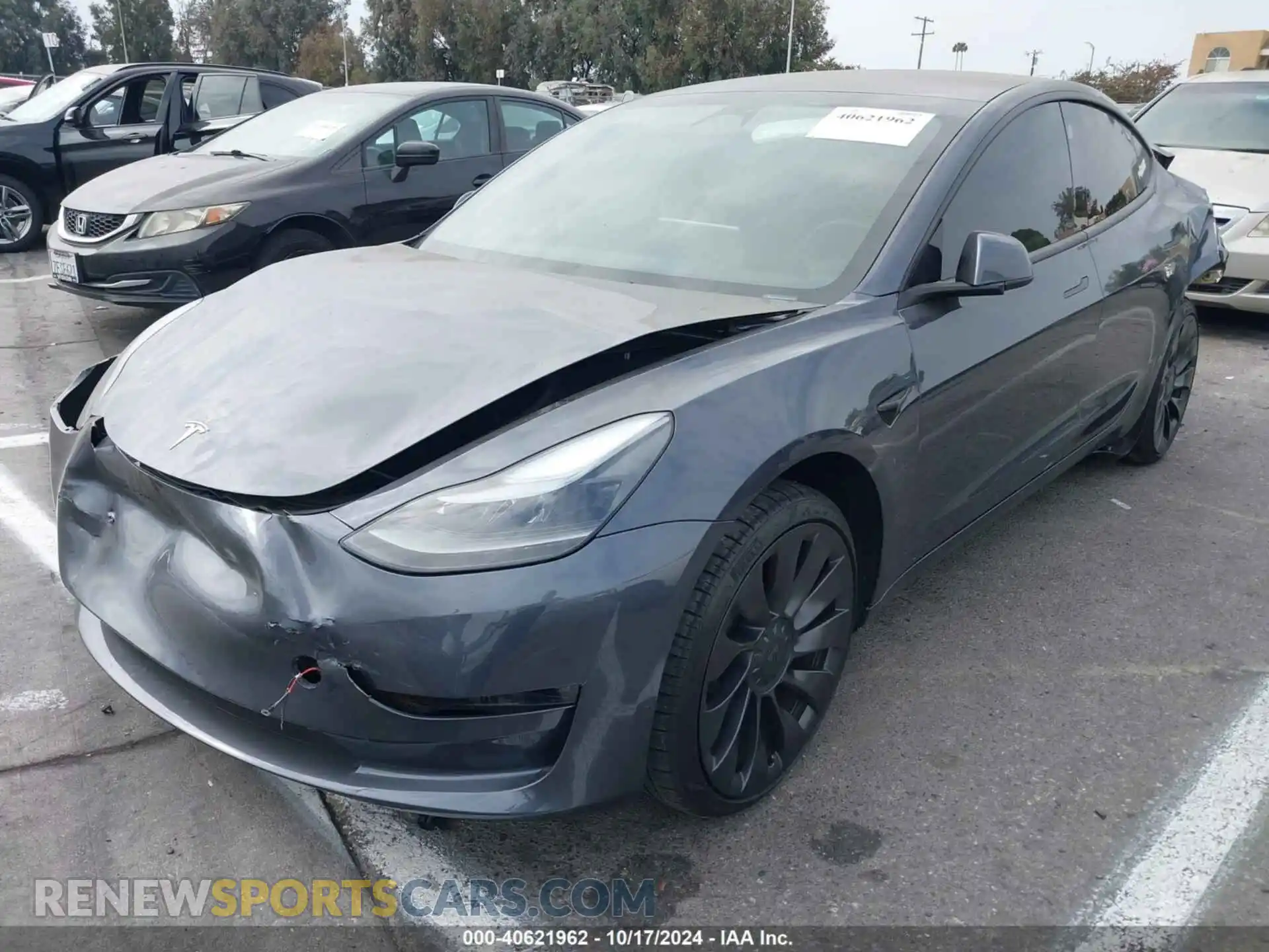 2 Photograph of a damaged car 5YJ3E1EC2PF712755 TESLA MODEL 3 2023