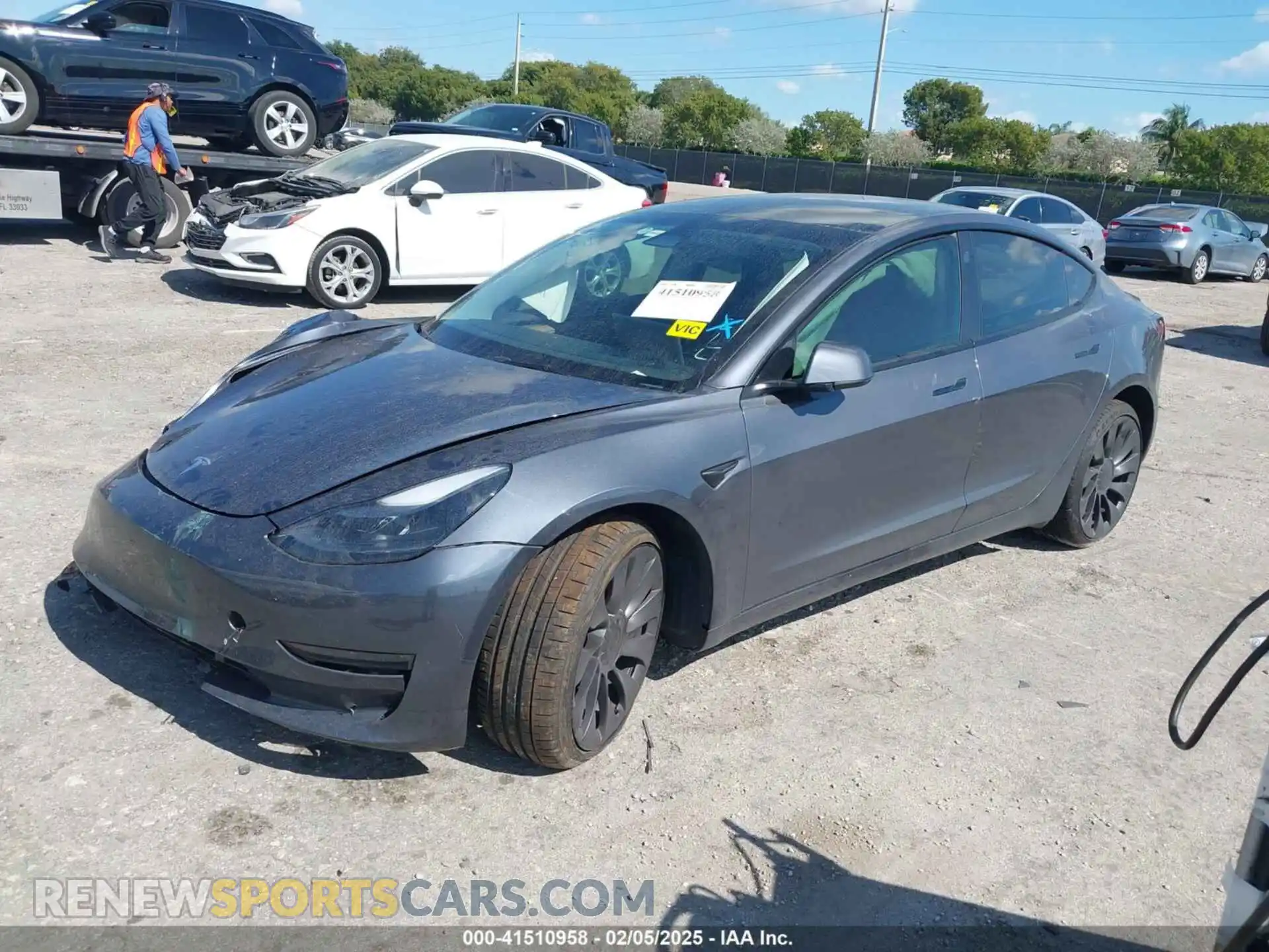 2 Photograph of a damaged car 5YJ3E1EC3PF696730 TESLA MODEL 3 2023