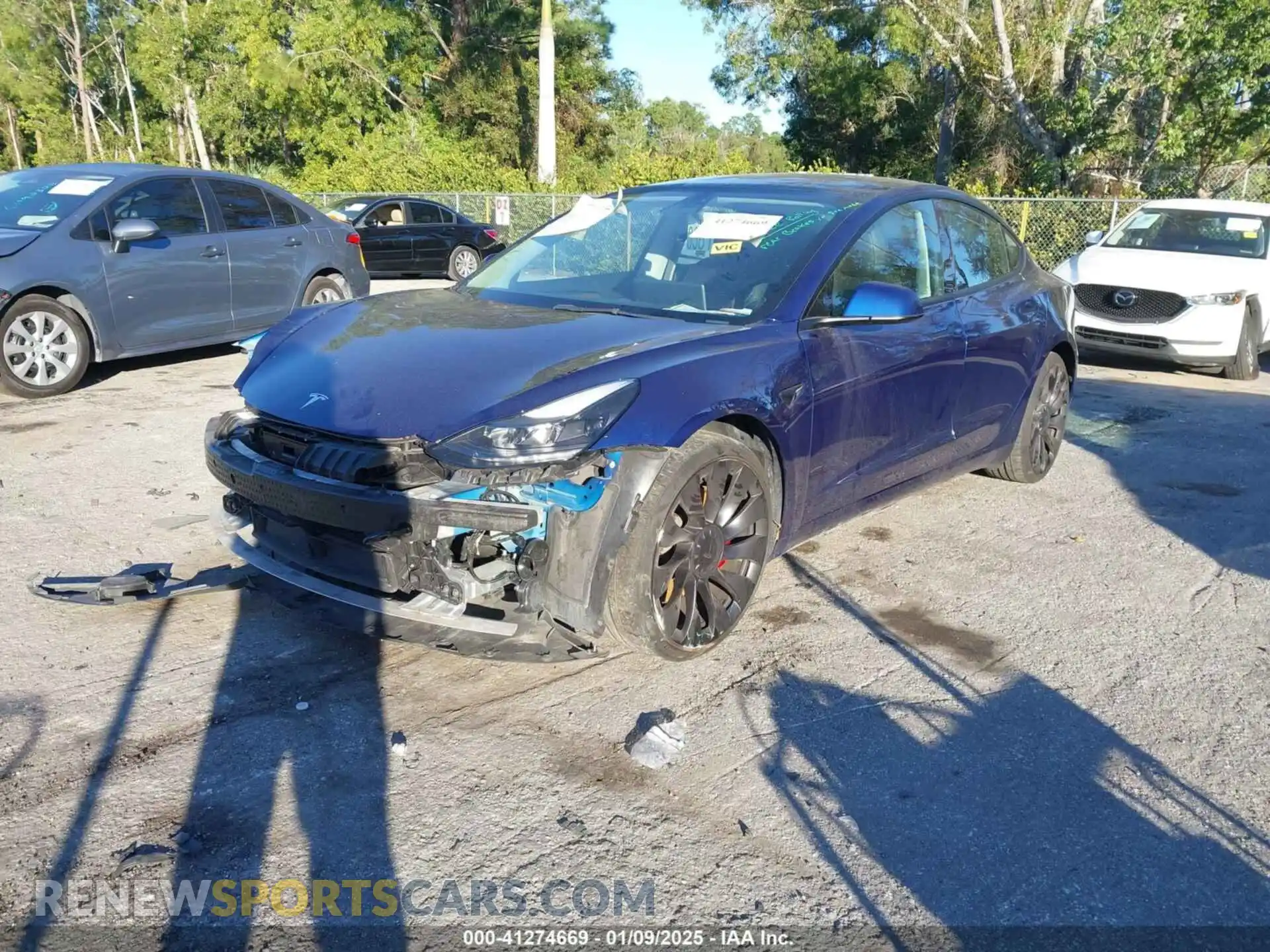 2 Photograph of a damaged car 5YJ3E1EC4PF404521 TESLA MODEL 3 2023