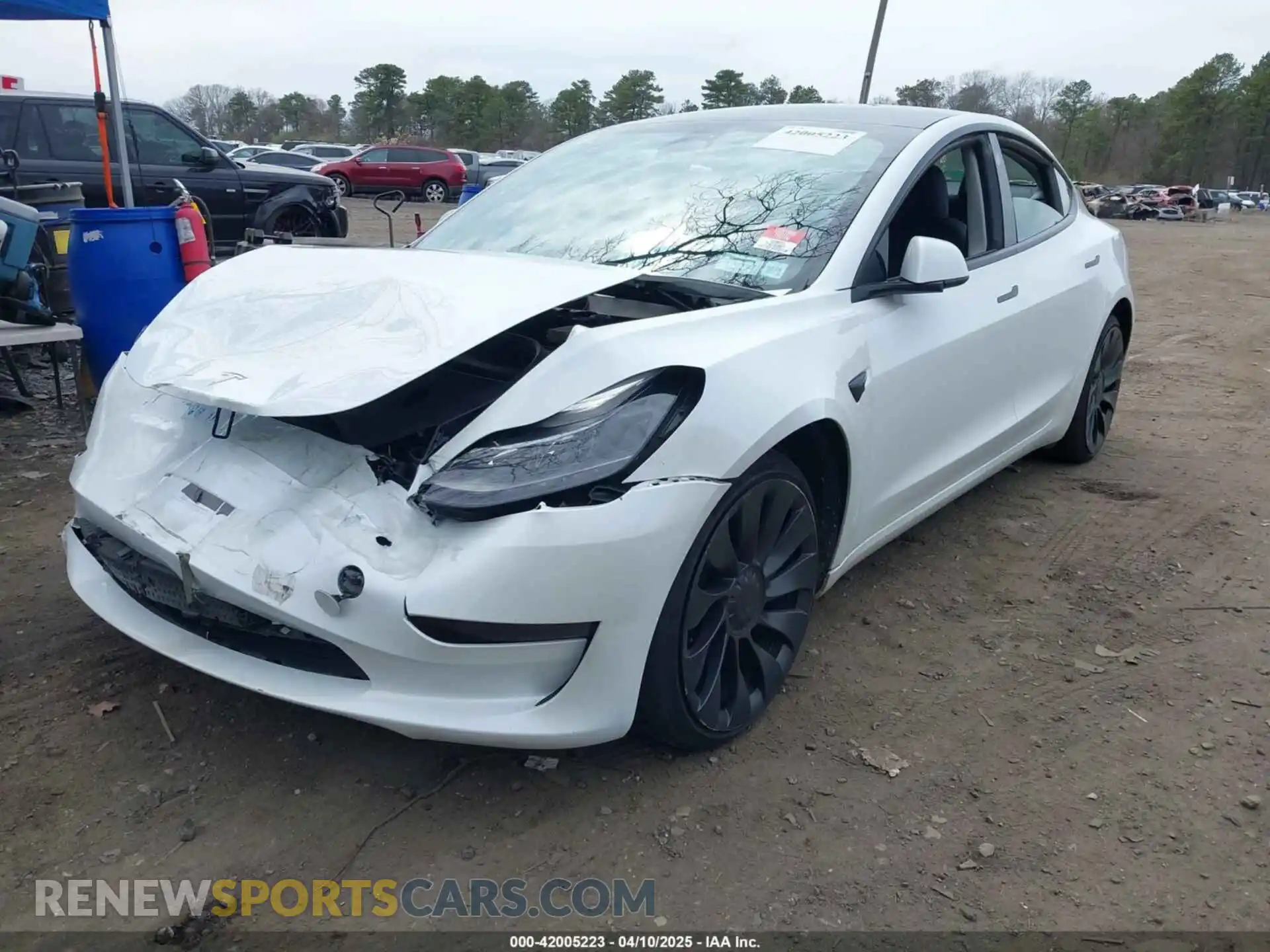 2 Photograph of a damaged car 5YJ3E1EC4PF461253 TESLA MODEL 3 2023