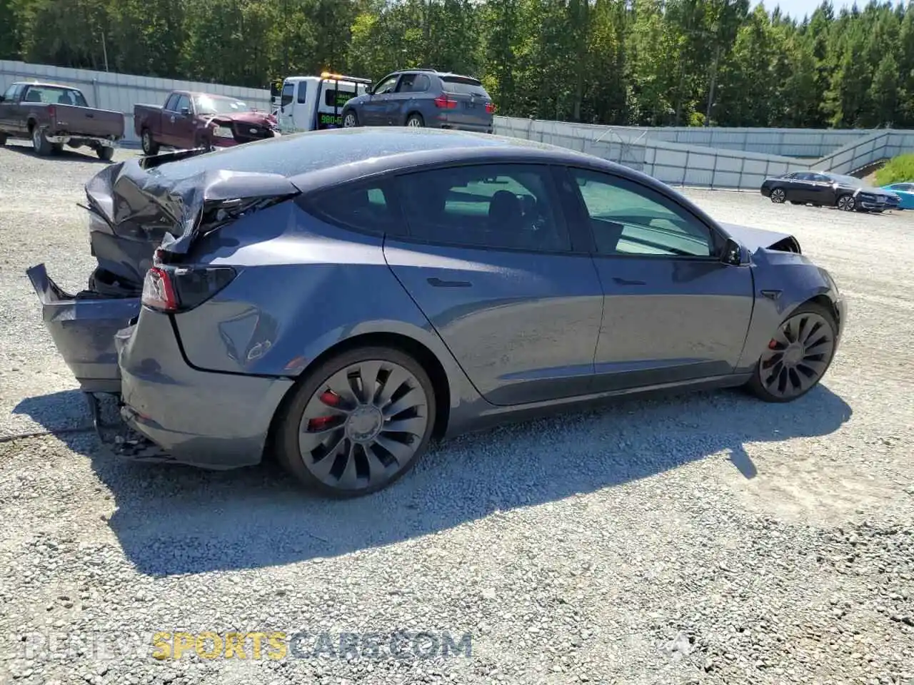 3 Photograph of a damaged car 5YJ3E1EC4PF619218 TESLA MODEL 3 2023
