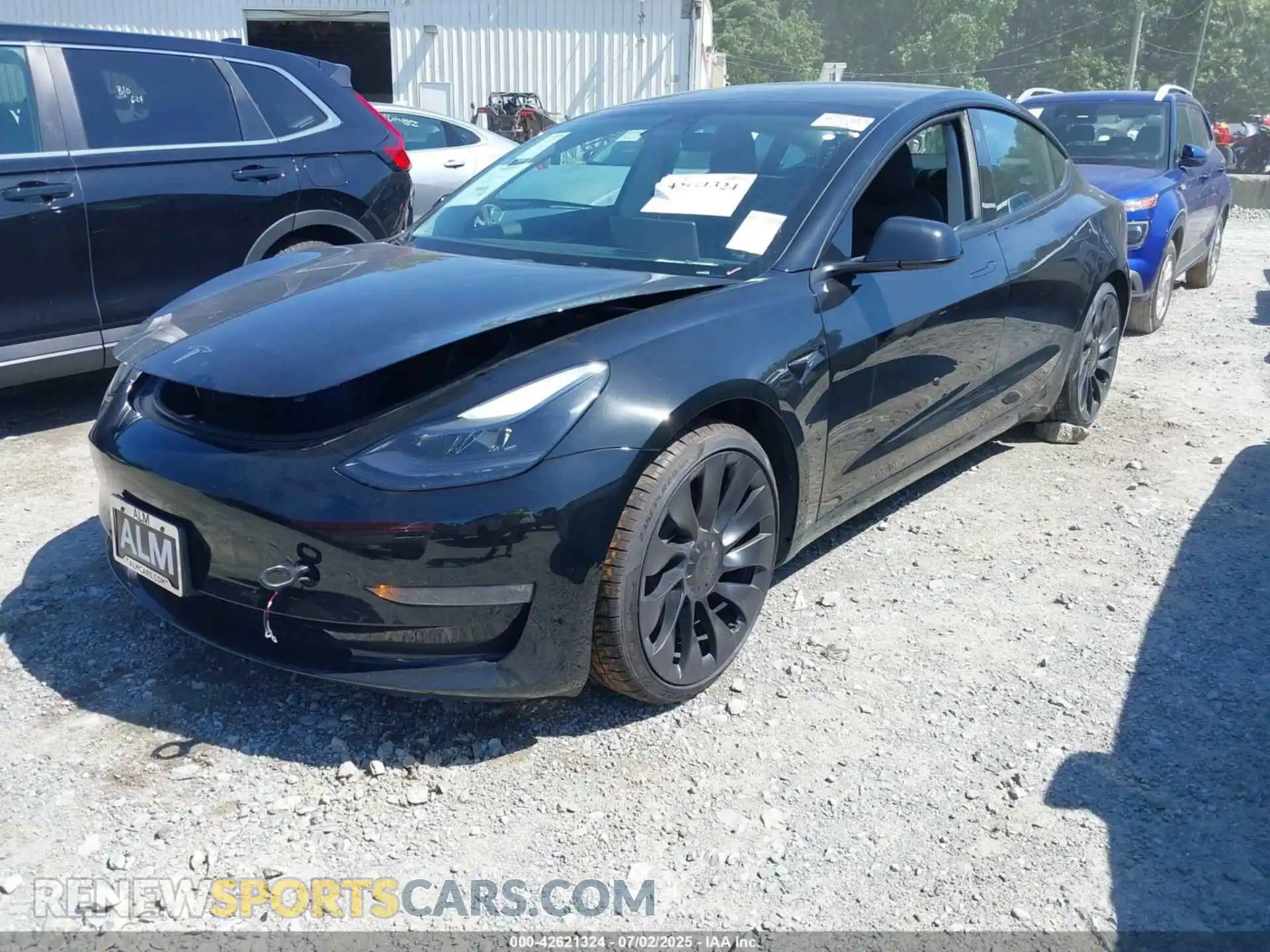 2 Photograph of a damaged car 5YJ3E1EC6PF395935 TESLA MODEL 3 2023