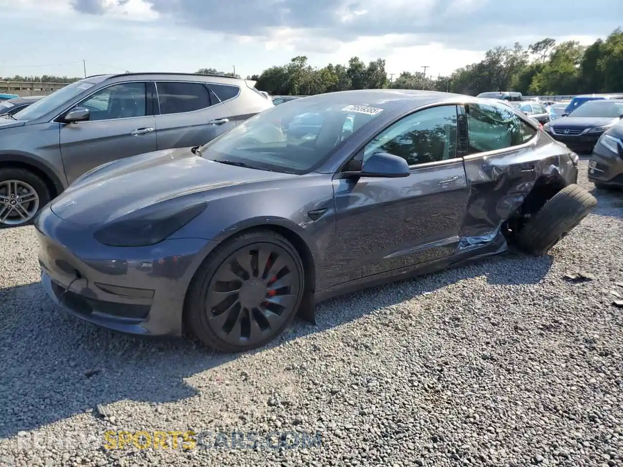 1 Photograph of a damaged car 5YJ3E1EC7PF612098 TESLA MODEL 3 2023