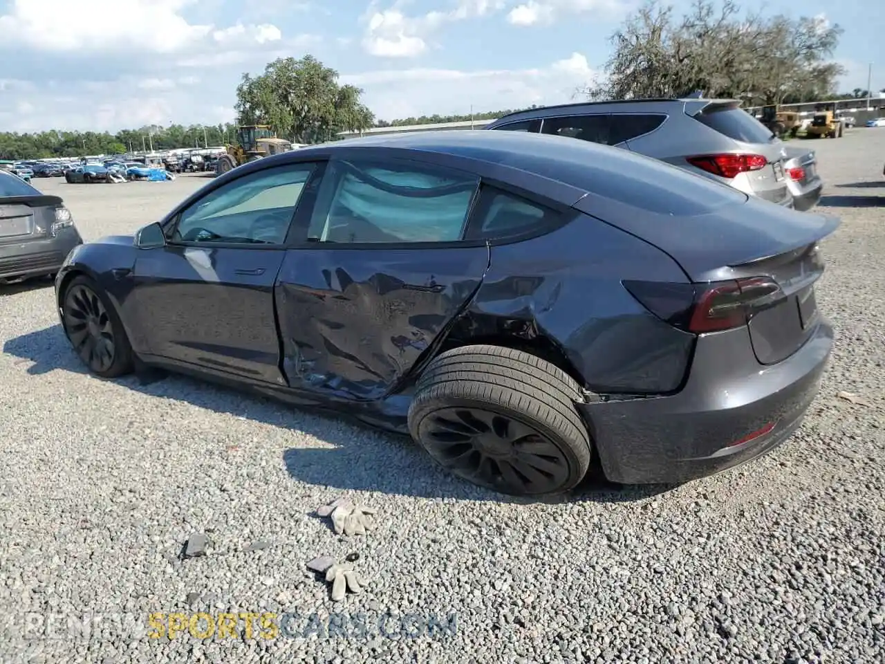 2 Photograph of a damaged car 5YJ3E1EC7PF612098 TESLA MODEL 3 2023