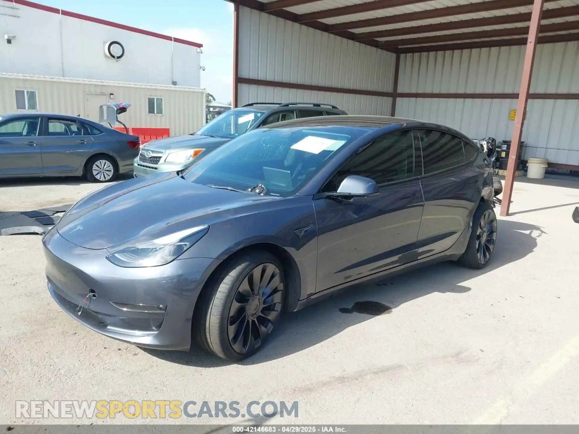2 Photograph of a damaged car 5YJ3E1ECXPF410212 TESLA MODEL 3 2023