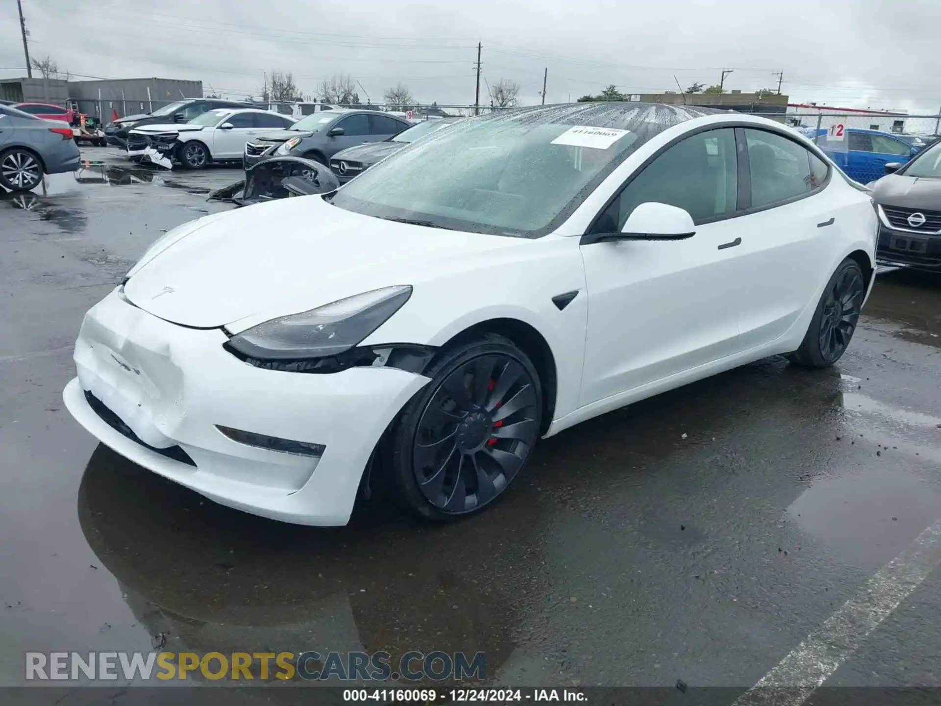 2 Photograph of a damaged car 5YJ3E1ECXPF582174 TESLA MODEL 3 2023