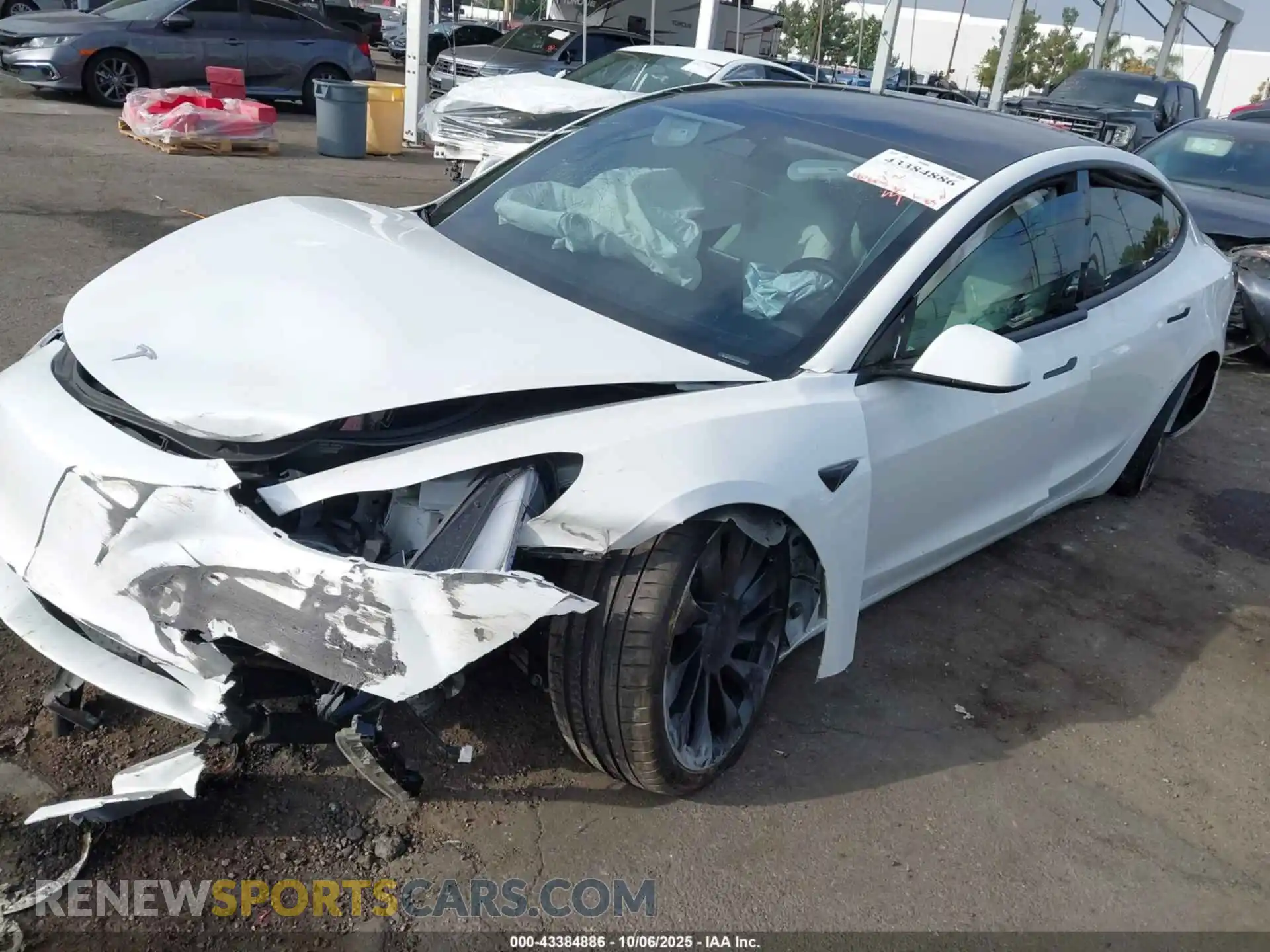 2 Photograph of a damaged car 5YJ3E1ECXPF627694 TESLA MODEL 3 2023