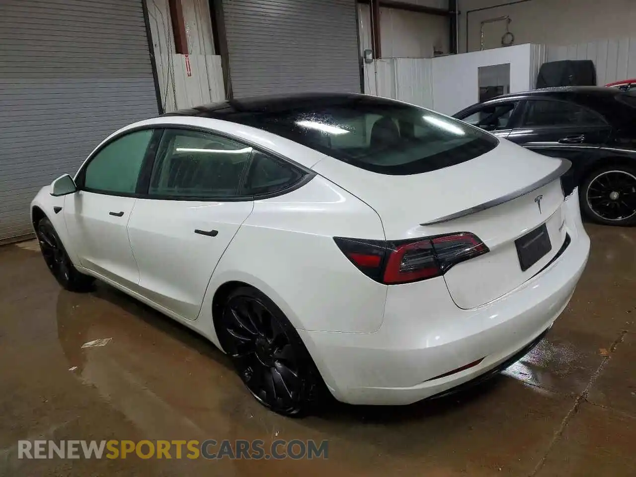 2 Photograph of a damaged car 5YJ3E1ECXPF667791 TESLA MODEL 3 2023