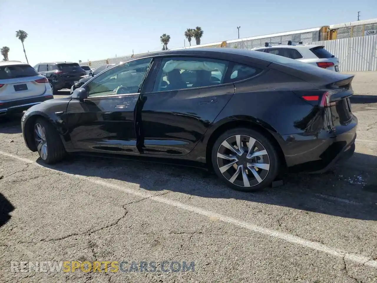 2 Photograph of a damaged car 5YJ3E1EA0RF751880 TESLA MODEL 3 2024