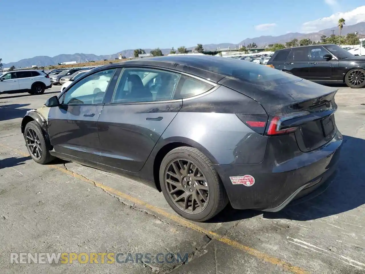 2 Photograph of a damaged car 5YJ3E1EA2RF722848 TESLA MODEL 3 2024