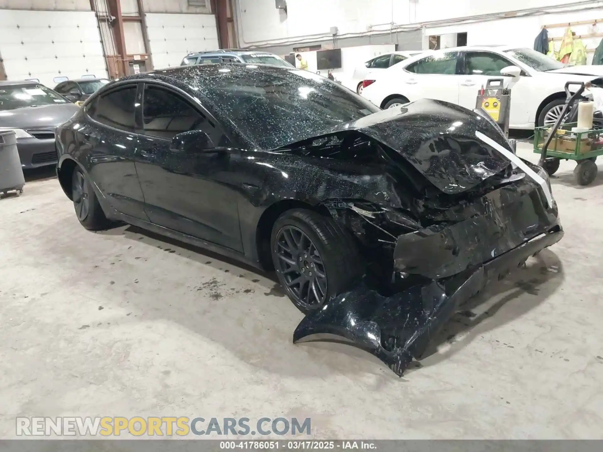 1 Photograph of a damaged car 5YJ3E1EA2RF856579 TESLA MODEL 3 2024
