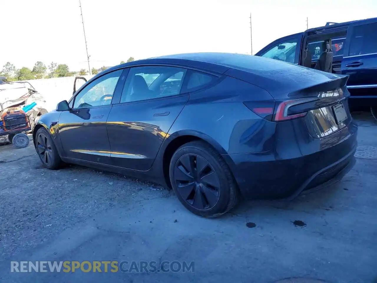 2 fotografías del automóvil dañado 5YJ3E1EA3RF744129 TESLA MODEL 3 2024