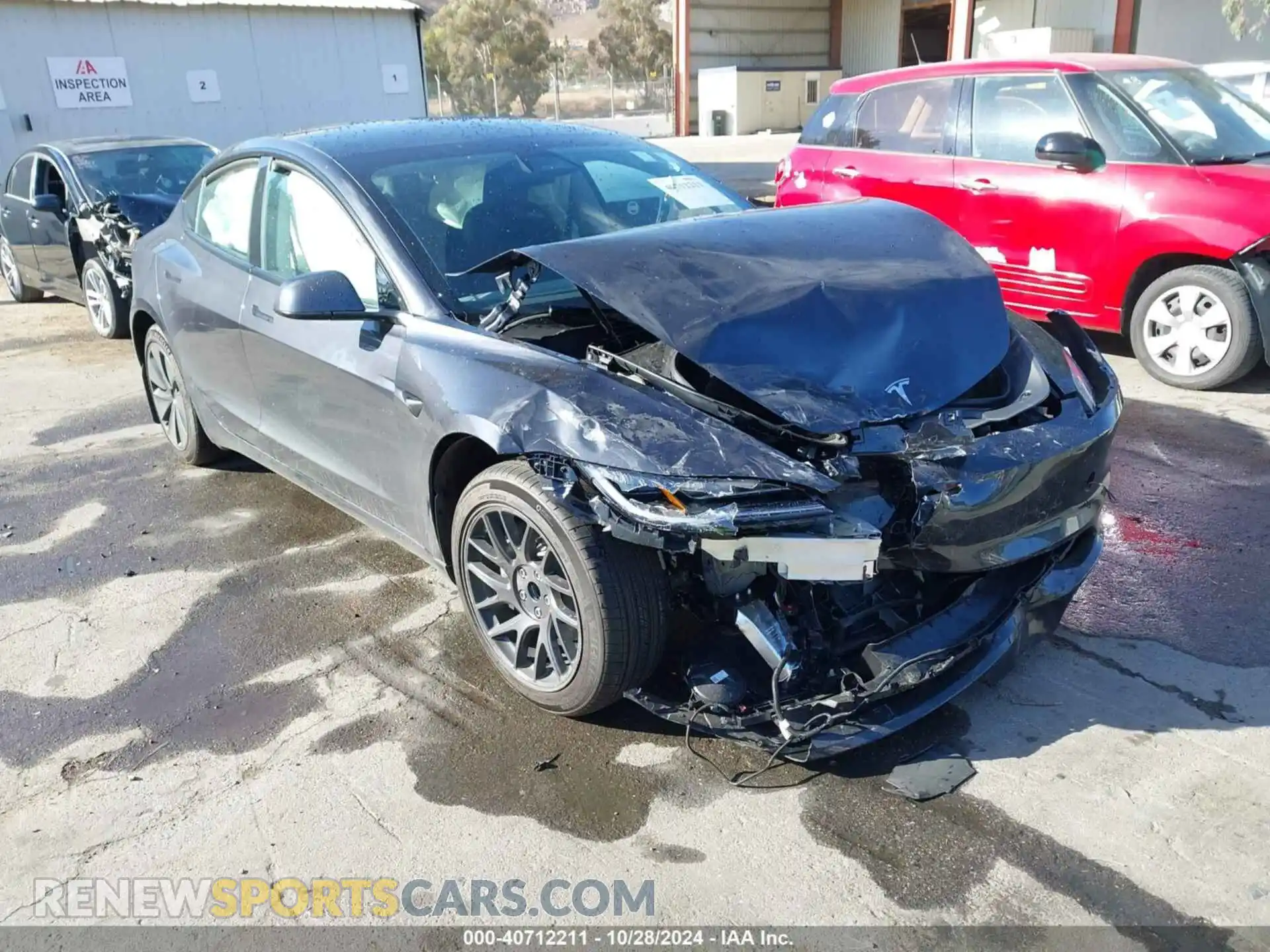 1 Photograph of a damaged car 5YJ3E1EA3RF843579 TESLA MODEL 3 2024