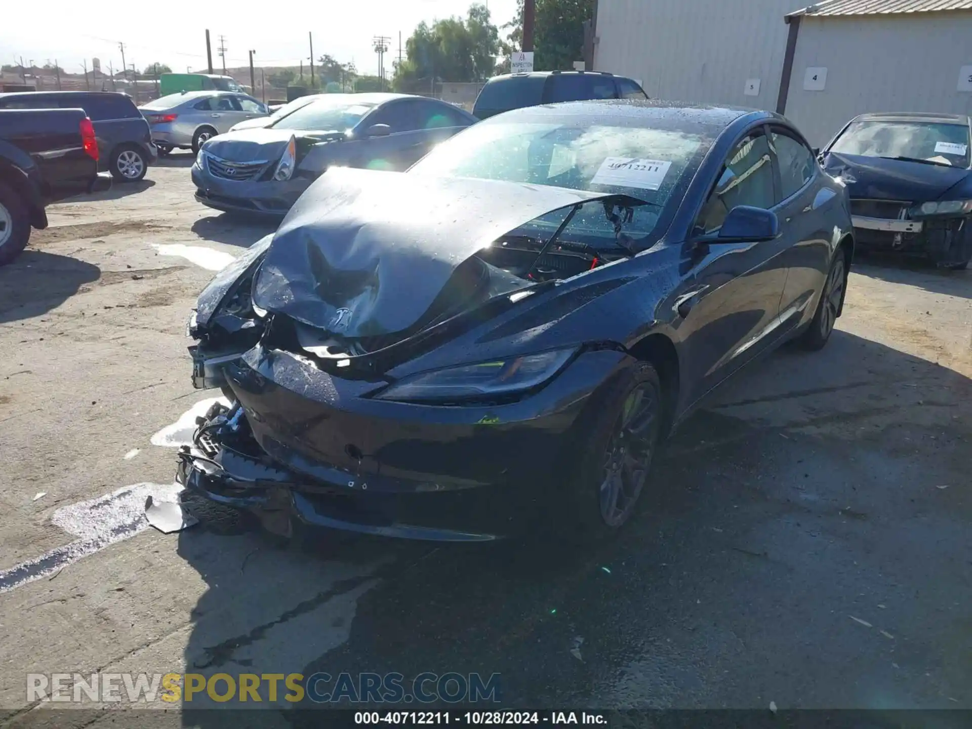 2 Photograph of a damaged car 5YJ3E1EA3RF843579 TESLA MODEL 3 2024
