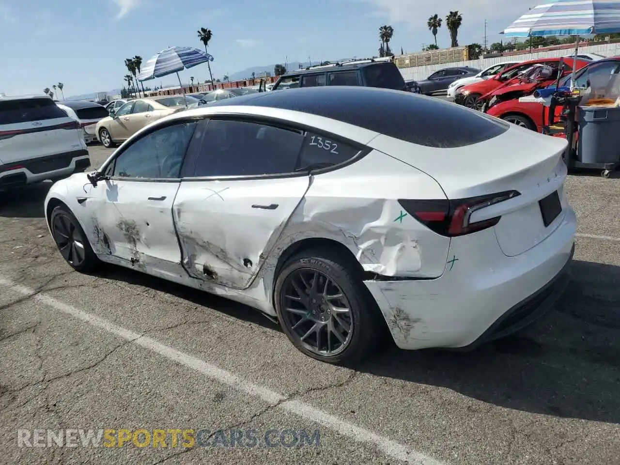 2 Photograph of a damaged car 5YJ3E1EA4RF786437 TESLA MODEL 3 2024
