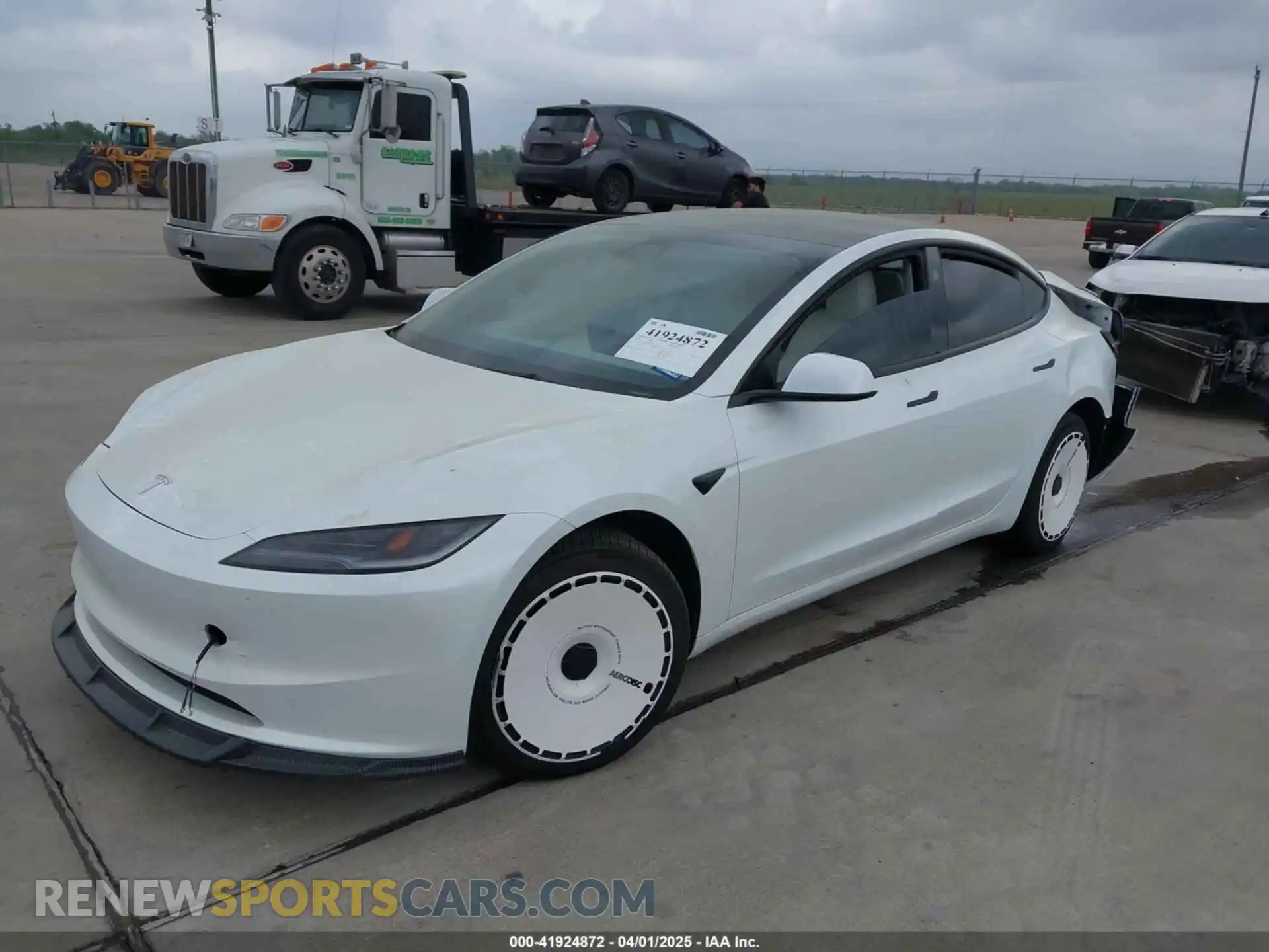2 Photograph of a damaged car 5YJ3E1EA4RF865607 TESLA MODEL 3 2024