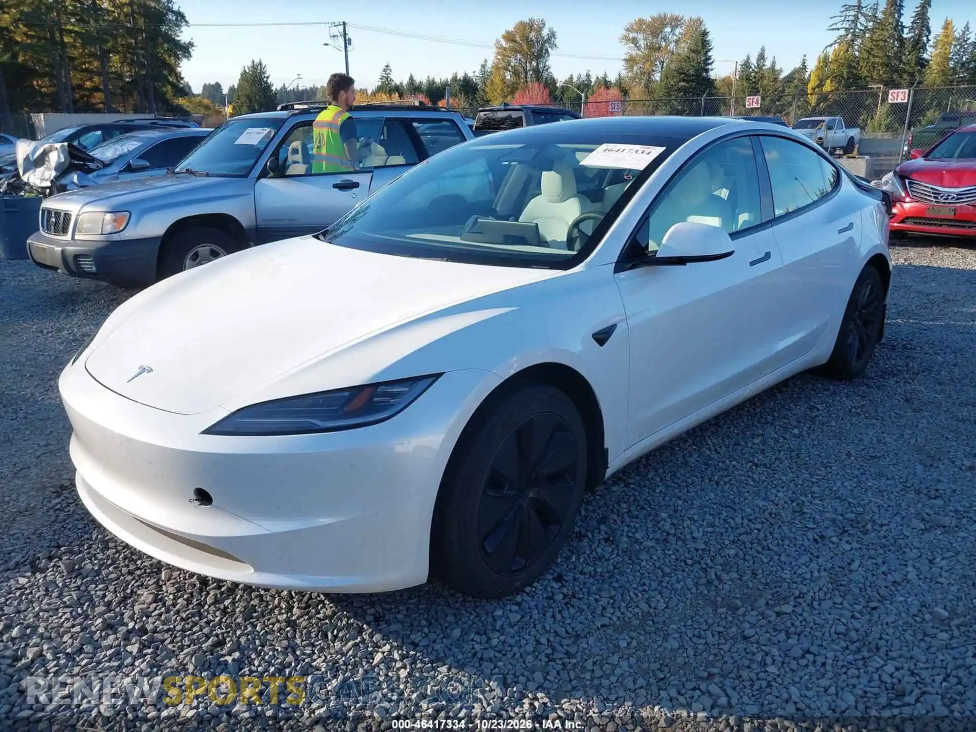 2 fotografías del automóvil dañado 5YJ3E1EA4RF869317 TESLA MODEL 3 2024