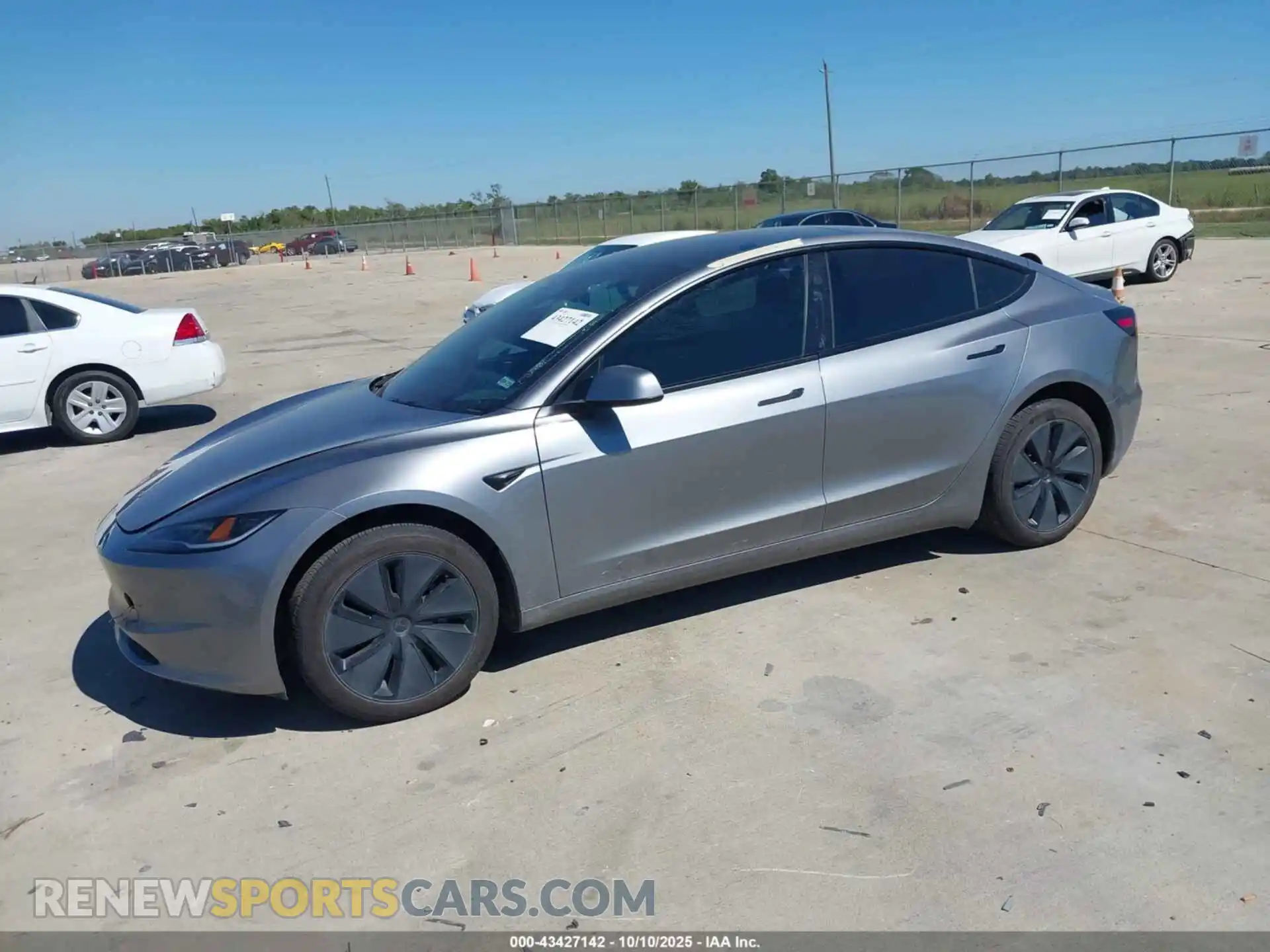 2 fotografías del automóvil dañado 5YJ3E1EA5RF857449 TESLA MODEL 3 2024