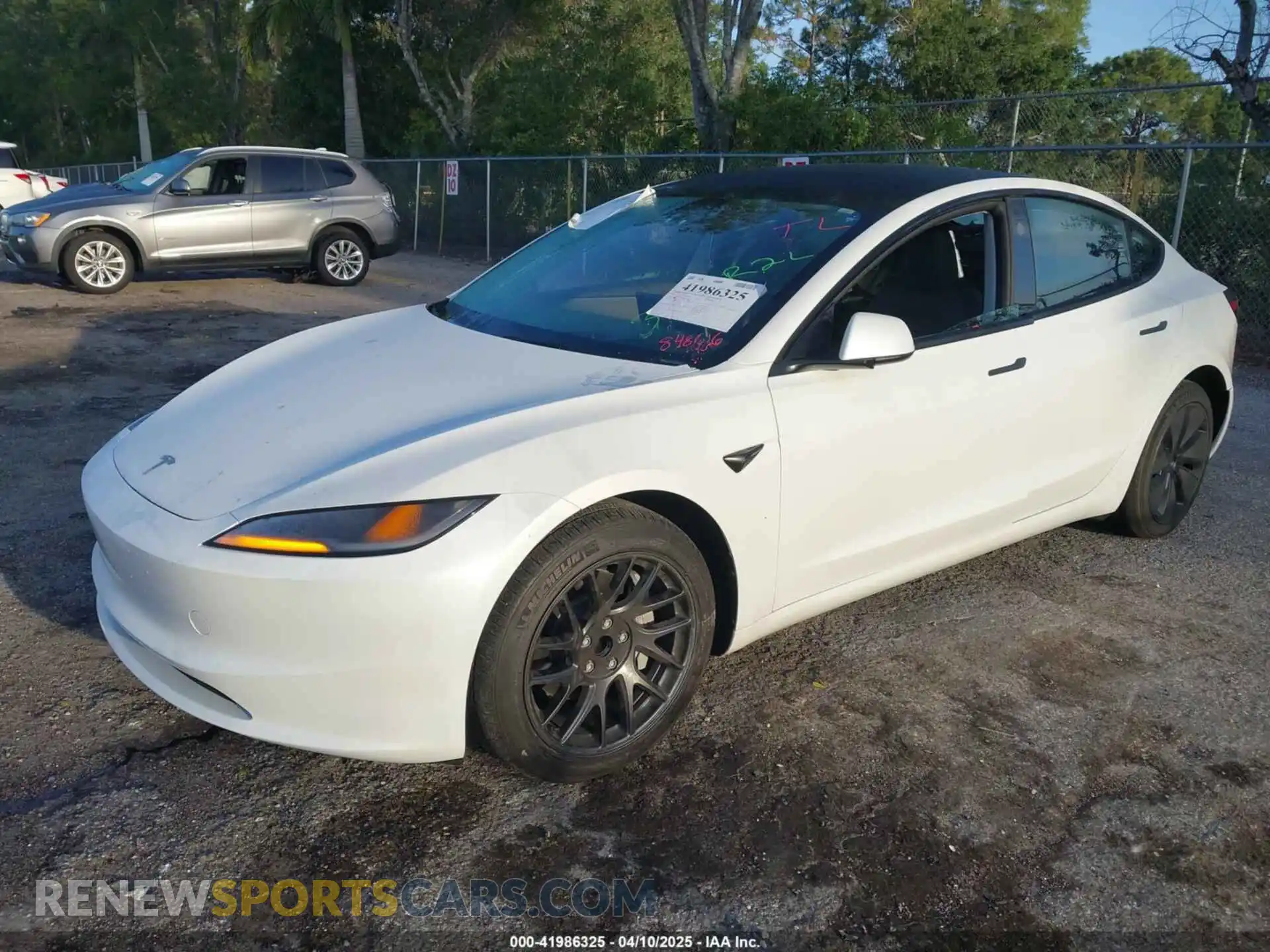 2 Photograph of a damaged car 5YJ3E1EA8RF848616 TESLA MODEL 3 2024