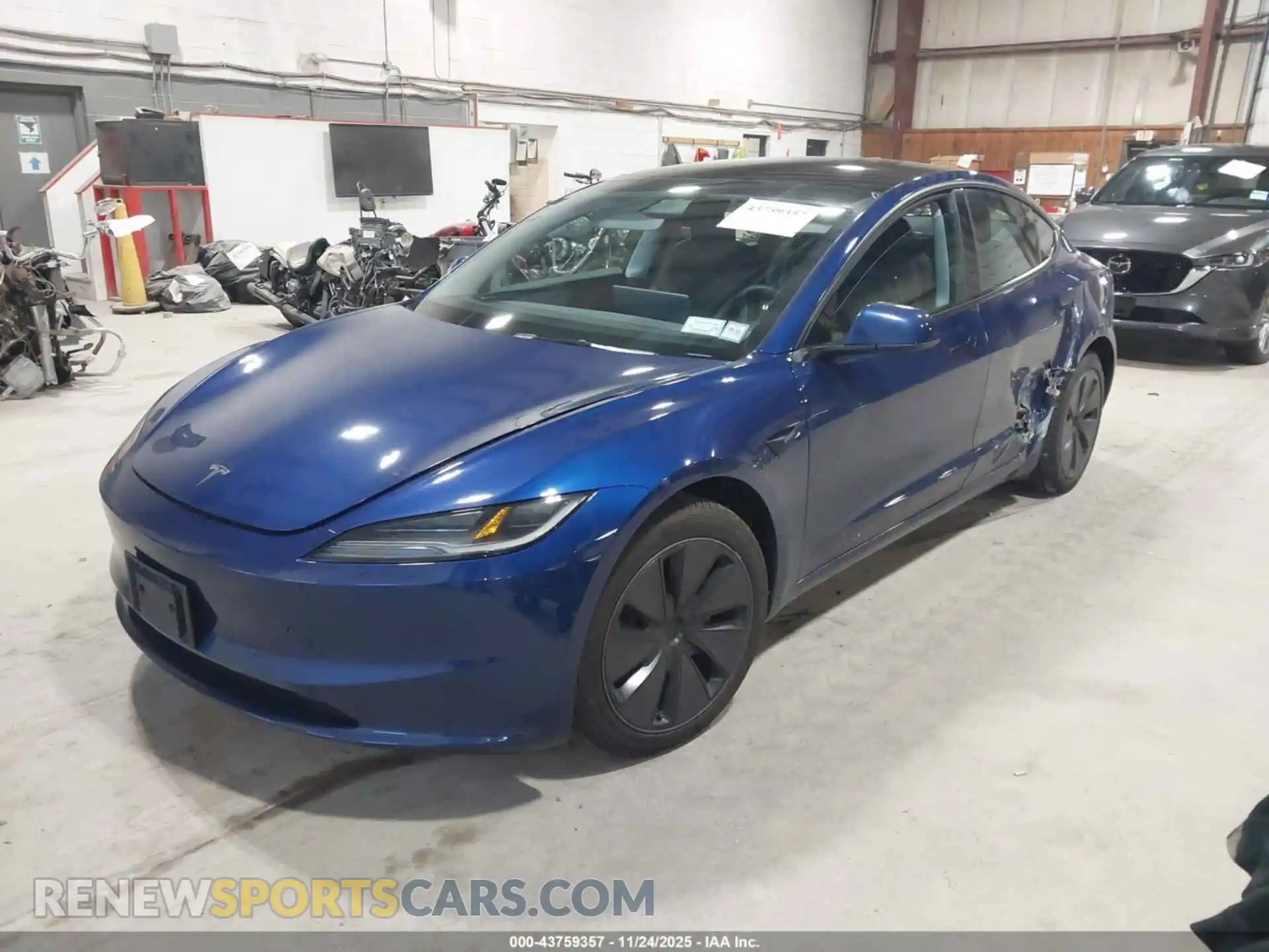 2 fotografías del automóvil dañado 5YJ3E1EAXRF848245 TESLA MODEL 3 2024