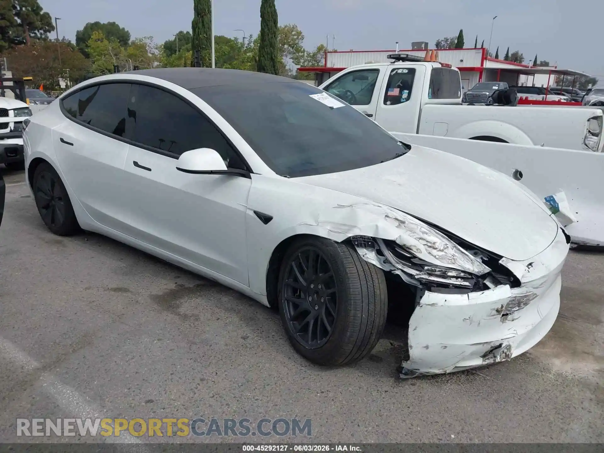1 Photograph of a damaged car 5YJ3E1EB4RF754712 TESLA MODEL 3 2024
