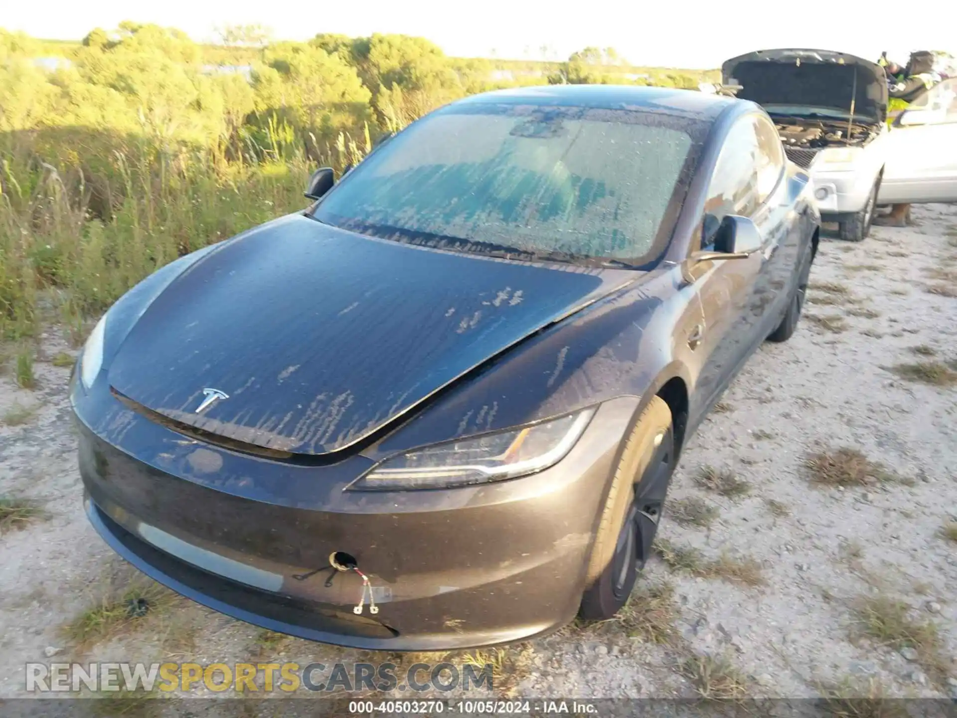 2 fotografías del automóvil dañado 5YJ3E1EB9RF755581 TESLA MODEL 3 2024