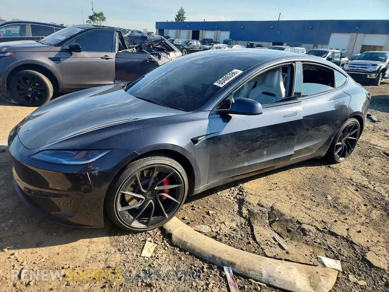 1 Photograph of a damaged car 5YJ3E1ET3RF894906 TESLA MODEL 3 2024