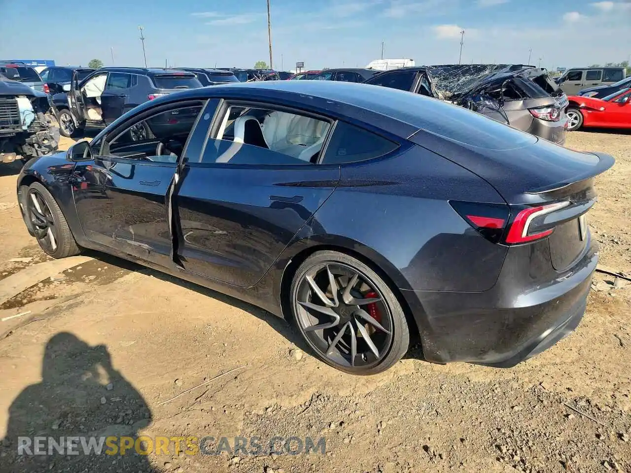 2 Photograph of a damaged car 5YJ3E1ET3RF894906 TESLA MODEL 3 2024