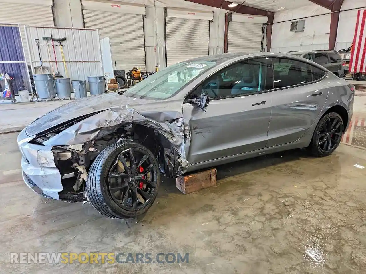 1 Photograph of a damaged car 5YJ3E1ET3RF900770 TESLA MODEL 3 2024