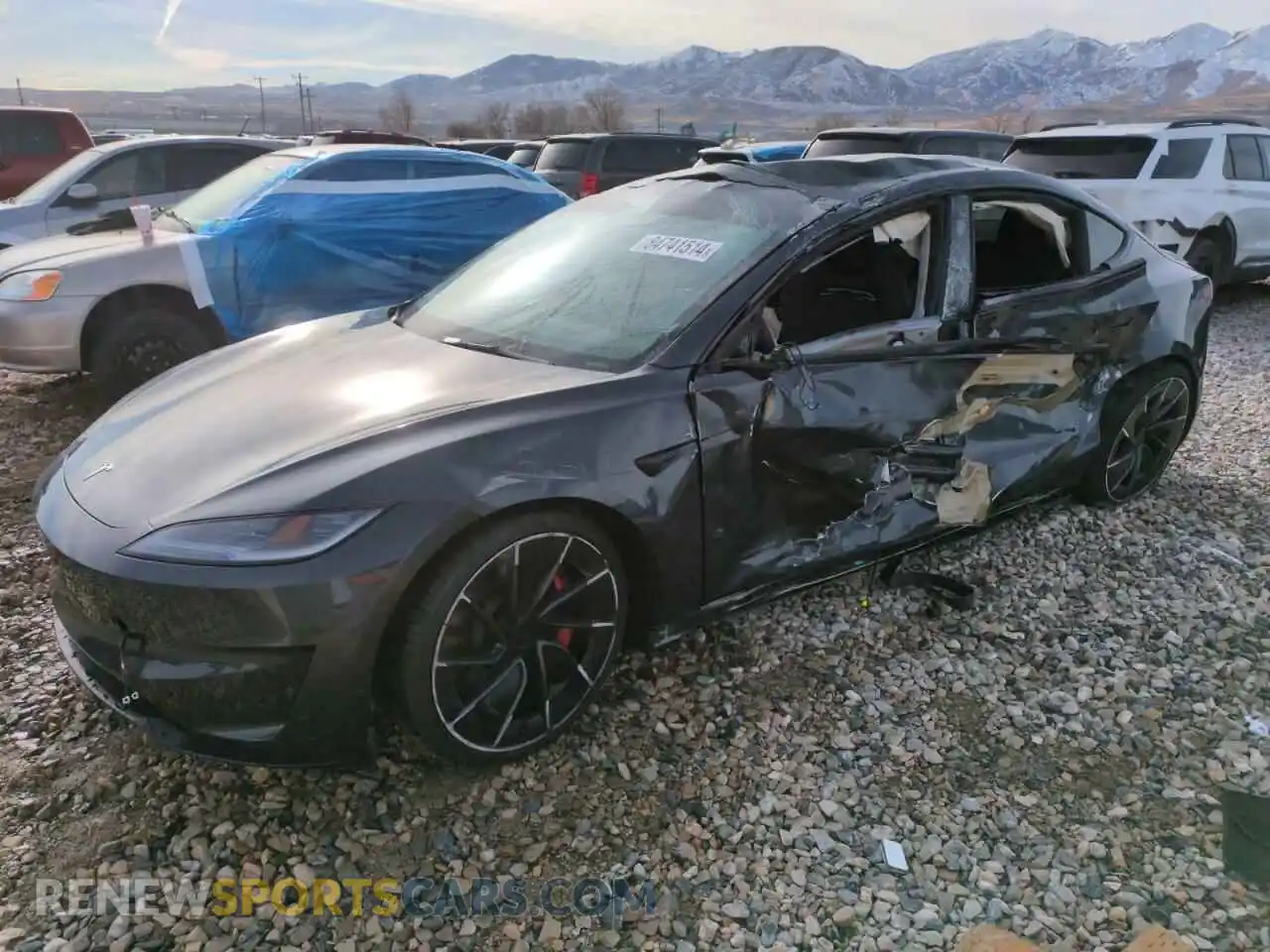 1 Photograph of a damaged car 5YJ3E1ET4RF820894 TESLA MODEL 3 2024