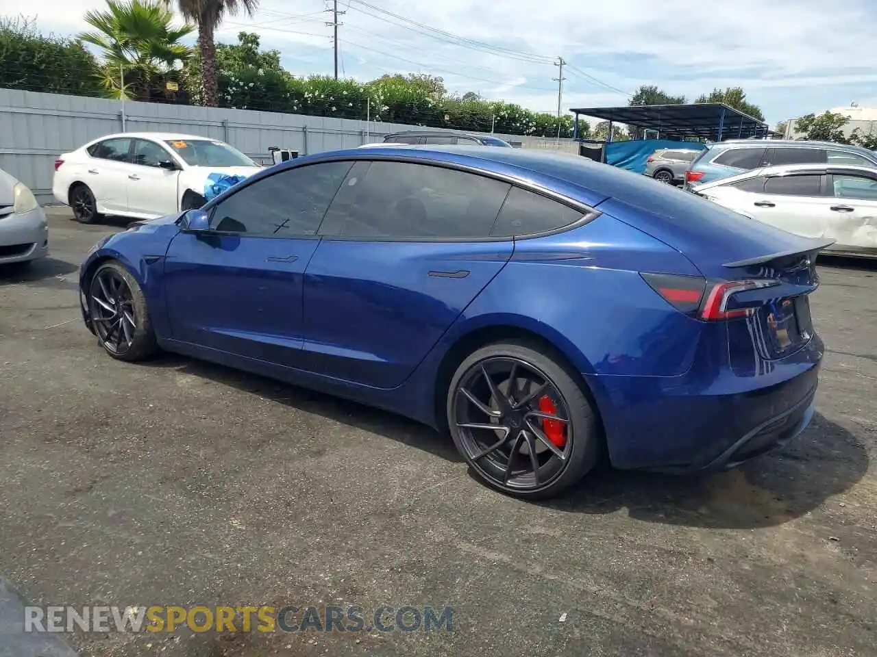 2 Photograph of a damaged car 5YJ3E1ET4RF848940 TESLA MODEL 3 2024