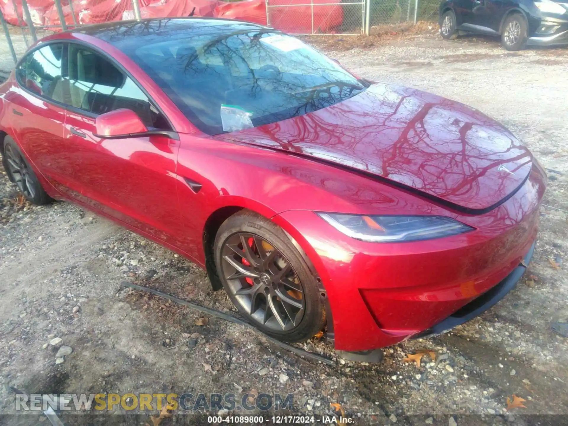 1 Photograph of a damaged car 5YJ3E1ETXRF809785 TESLA MODEL 3 2024